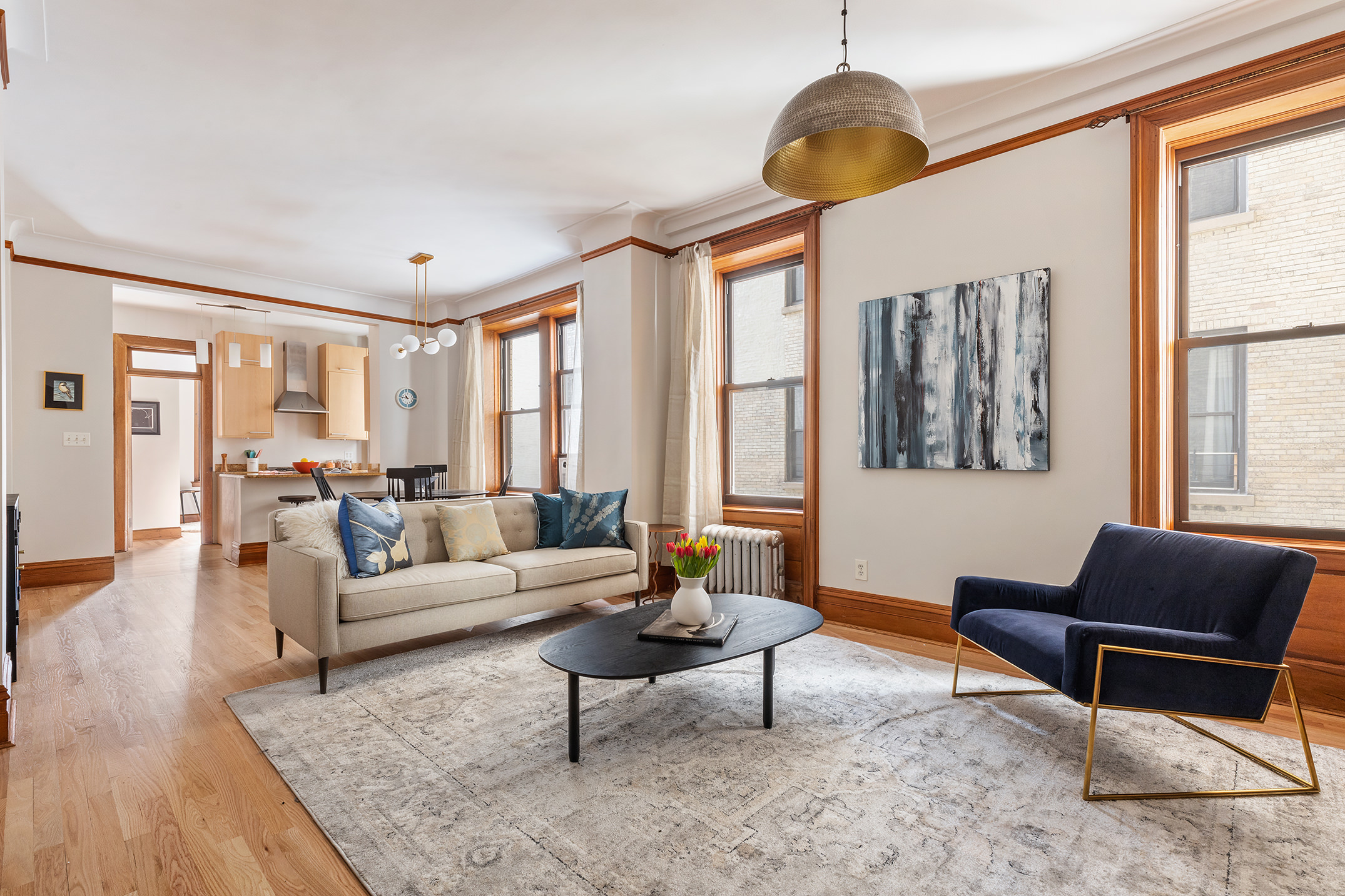 790 Riverside Drive, Unit 4C Manhattan, NY 10032 - Photo 4 of 11 a living room with furniture and a window
