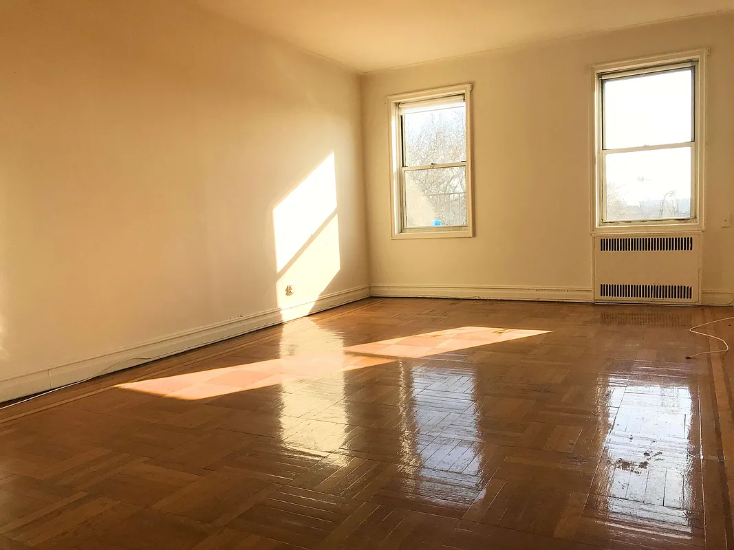 100 Avenue P, Unit 6D Brooklyn, NY 11204 - Photo 3 of 4 a view of an empty room and window