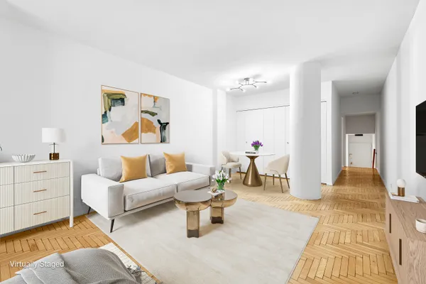 a living room with furniture and a table