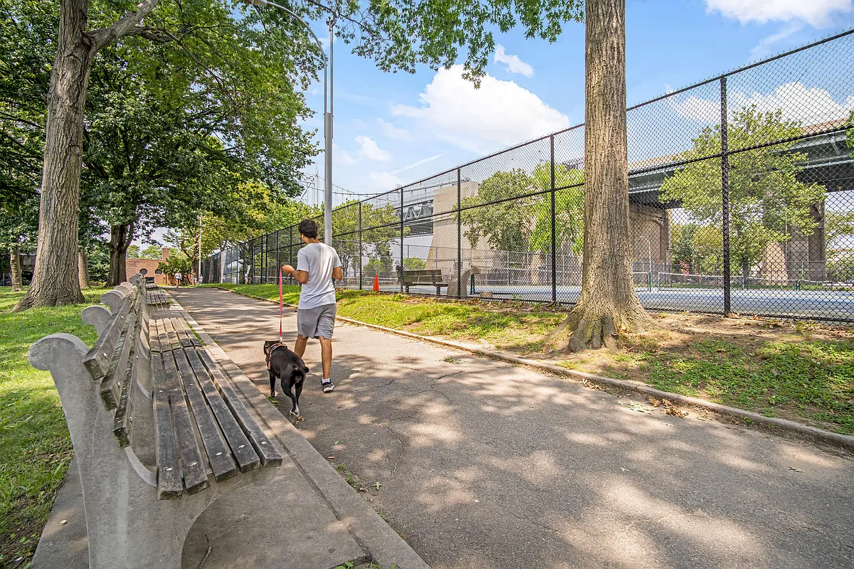 12-16 30th Avenue, Unit 205 Queens, NY 11102 - Photo 10 of 15 a view of a swimming pool with a patio