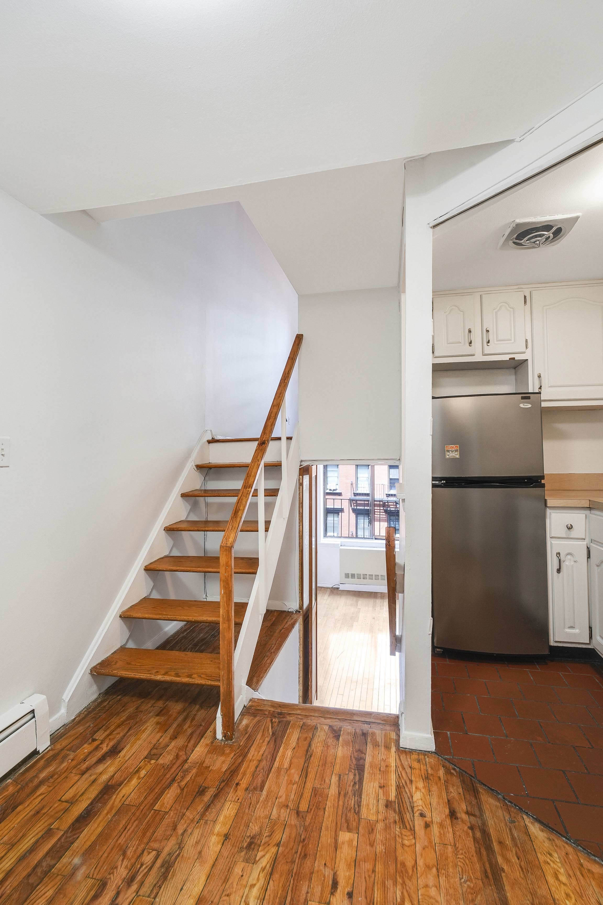 160 East 26th Street, Unit 5F Manhattan, NY 10010 - Photo 4 of 10 a view of entryway and hall with wooden floor