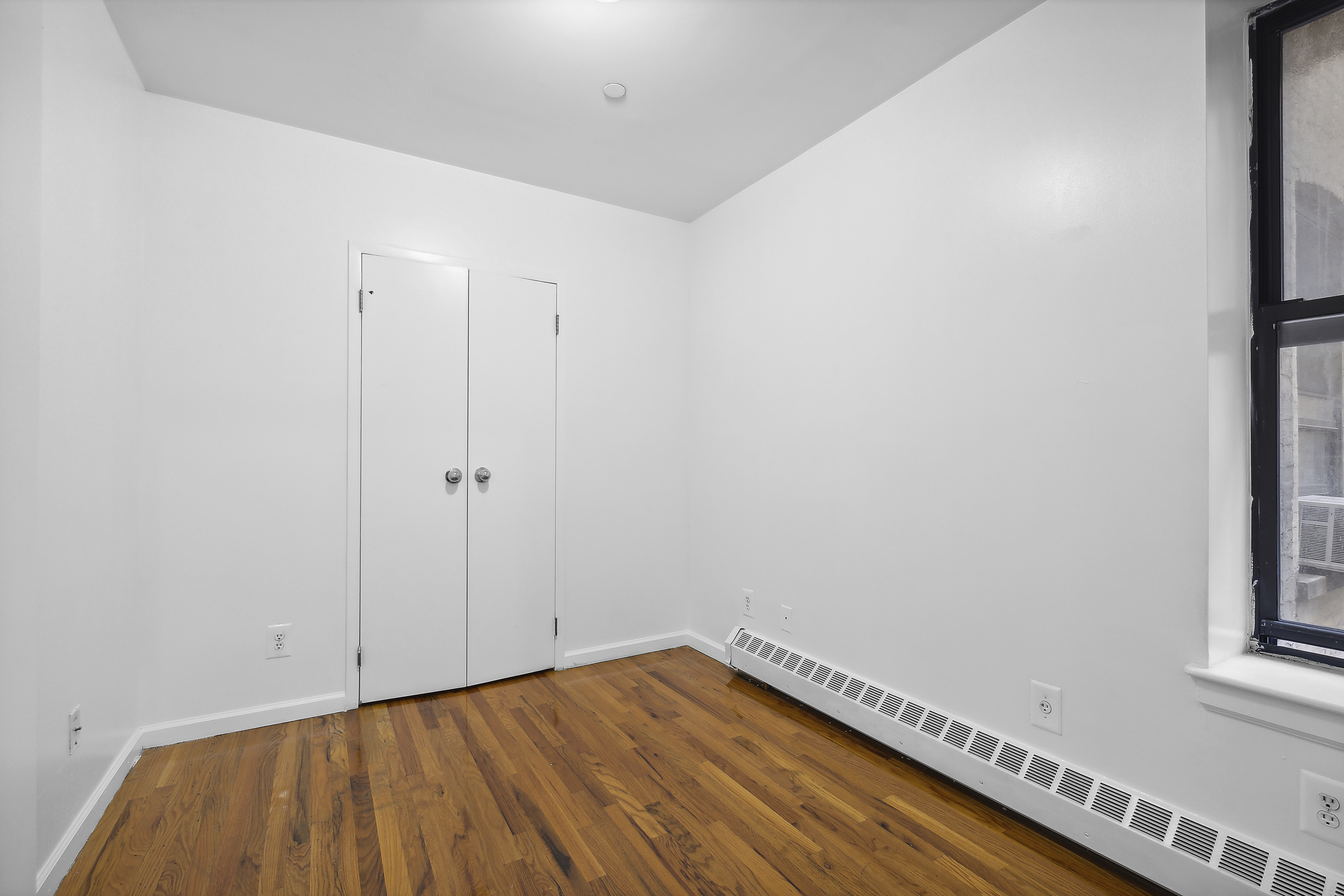 660 St Nicholas Avenue, Unit 33 Manhattan, NY 10030 - Photo 6 of 11 a view of an empty room