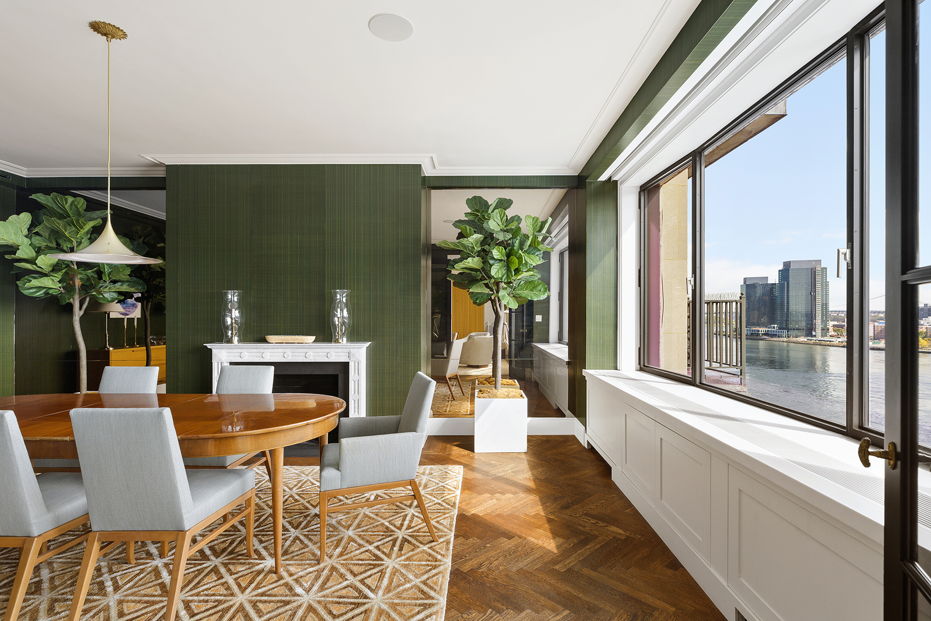 10 Gracie Square, Unit 8D Manhattan, NY 10028 - Photo 8 of 20 a living room with furniture and a potted plant