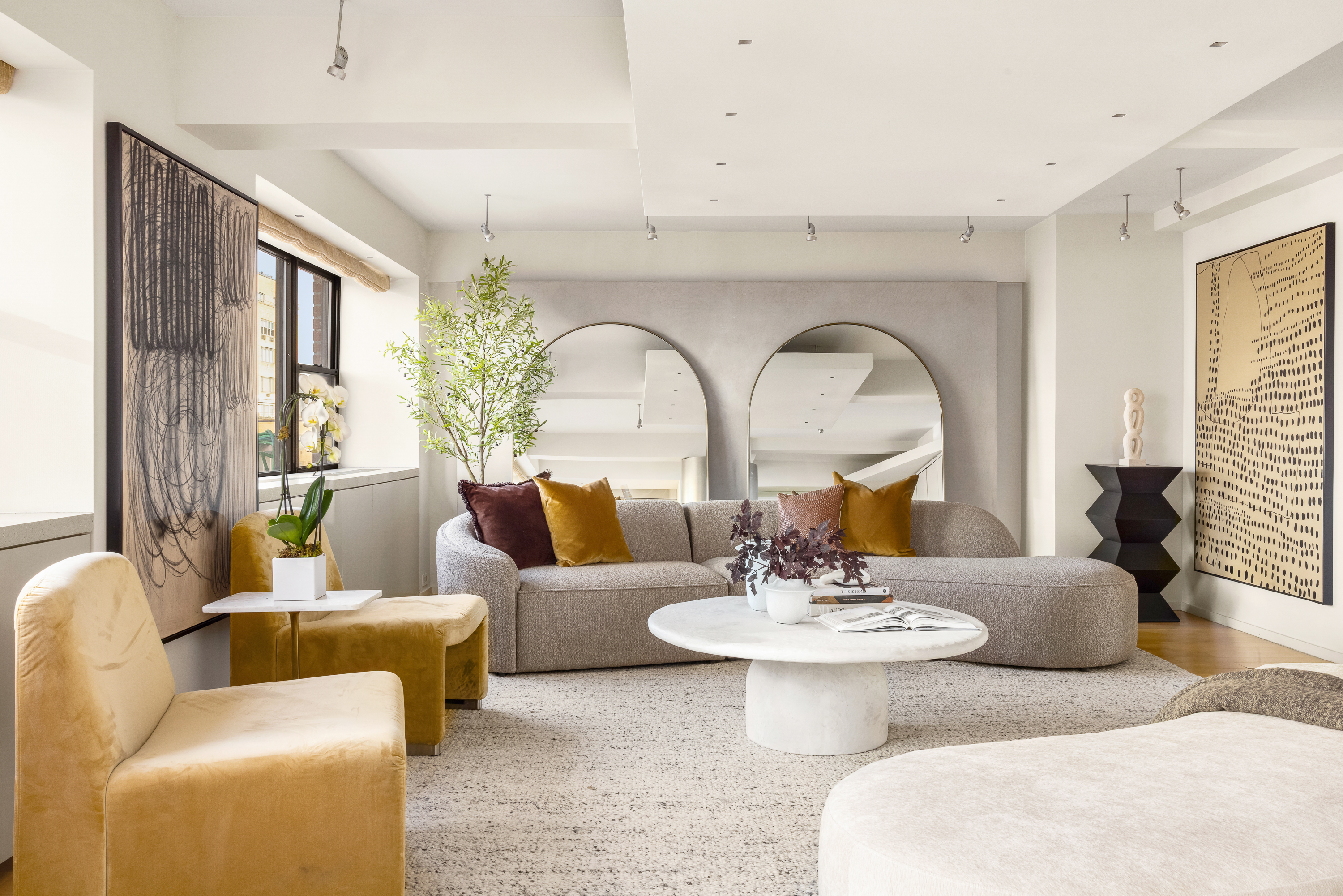 510 East 86th Street, Unit 17C Manhattan, NY 10028 - Photo 1 of 31 a living room with patio furniture and a large window