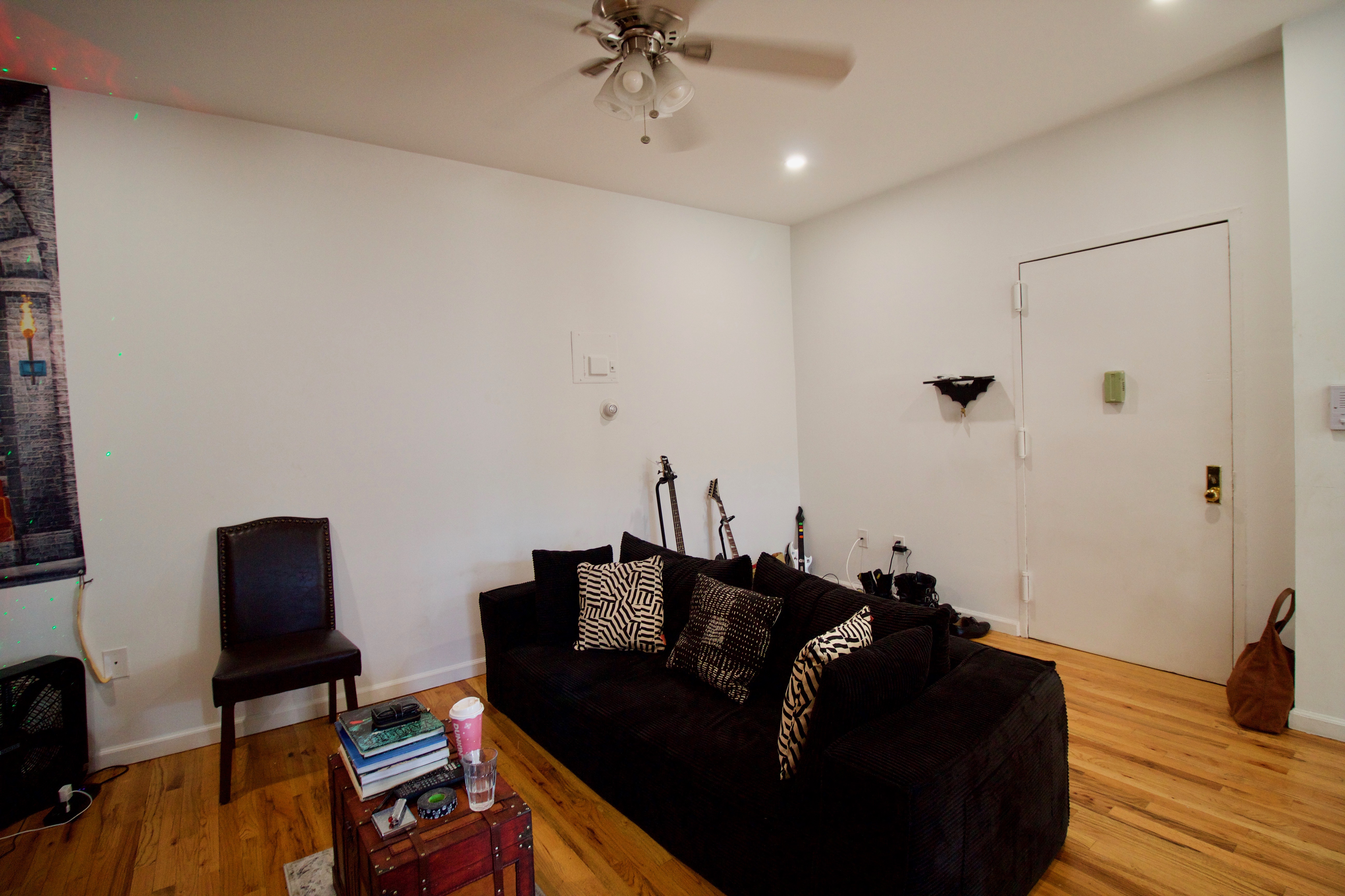 134 Union Street, Unit 2R Brooklyn, NY 11231 - Photo 32 of 37 a living room with furniture and a wooden floor