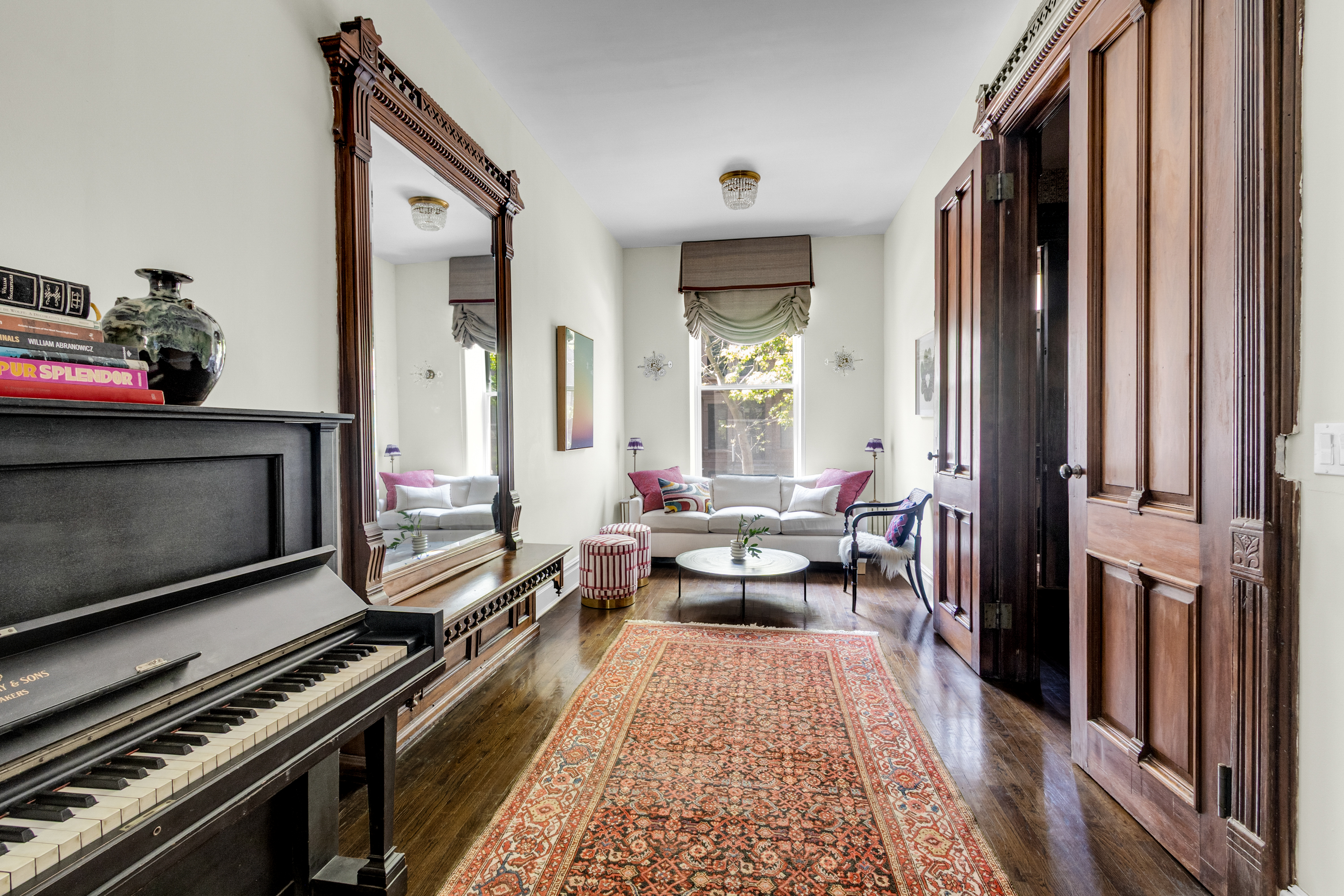 125 West 132nd Street Manhattan, NY 10027 - Photo 7 of 21 a living room with furniture and a fireplace