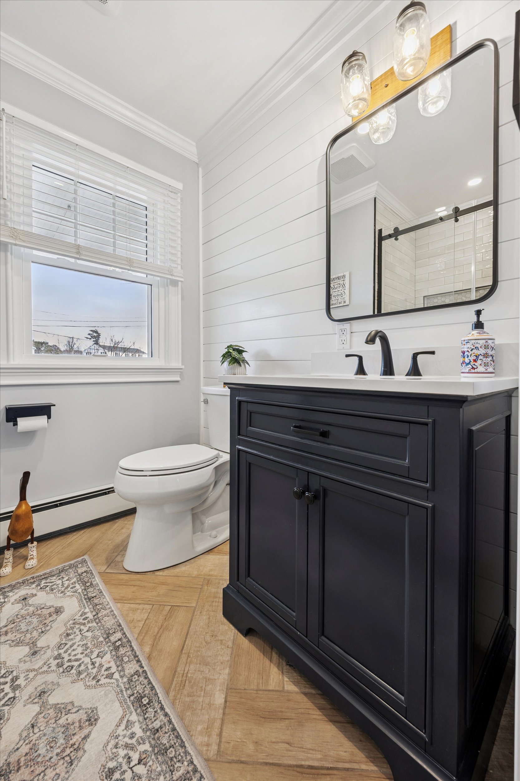 535 Bell Lane Ambler, PA 19002 - Photo 14 of 45 a bathroom with a sink and a mirror