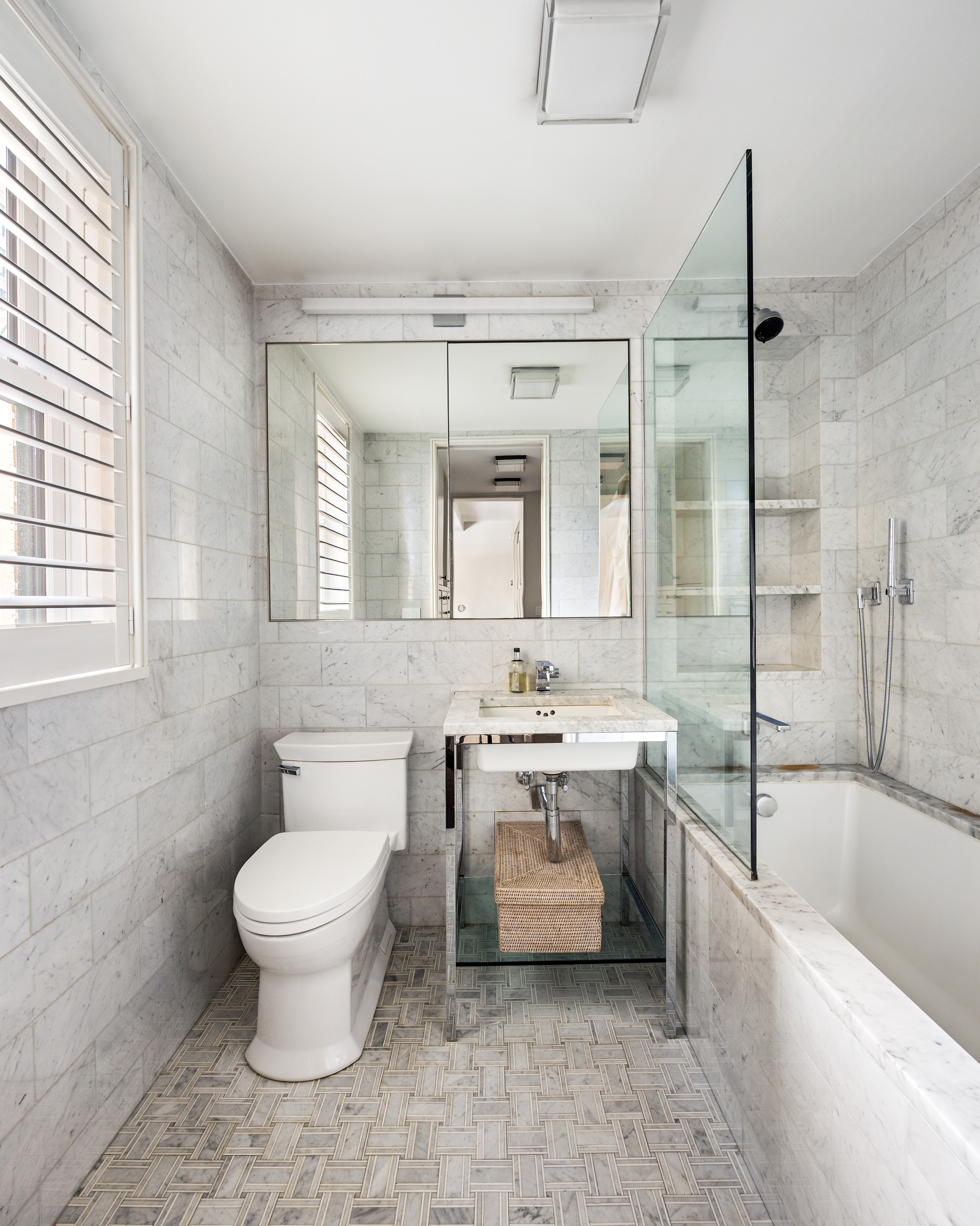 169 East 78th Street, Unit 7C Manhattan, NY 10075 - Photo 22 of 30 a bathroom with a sink toilet and tub