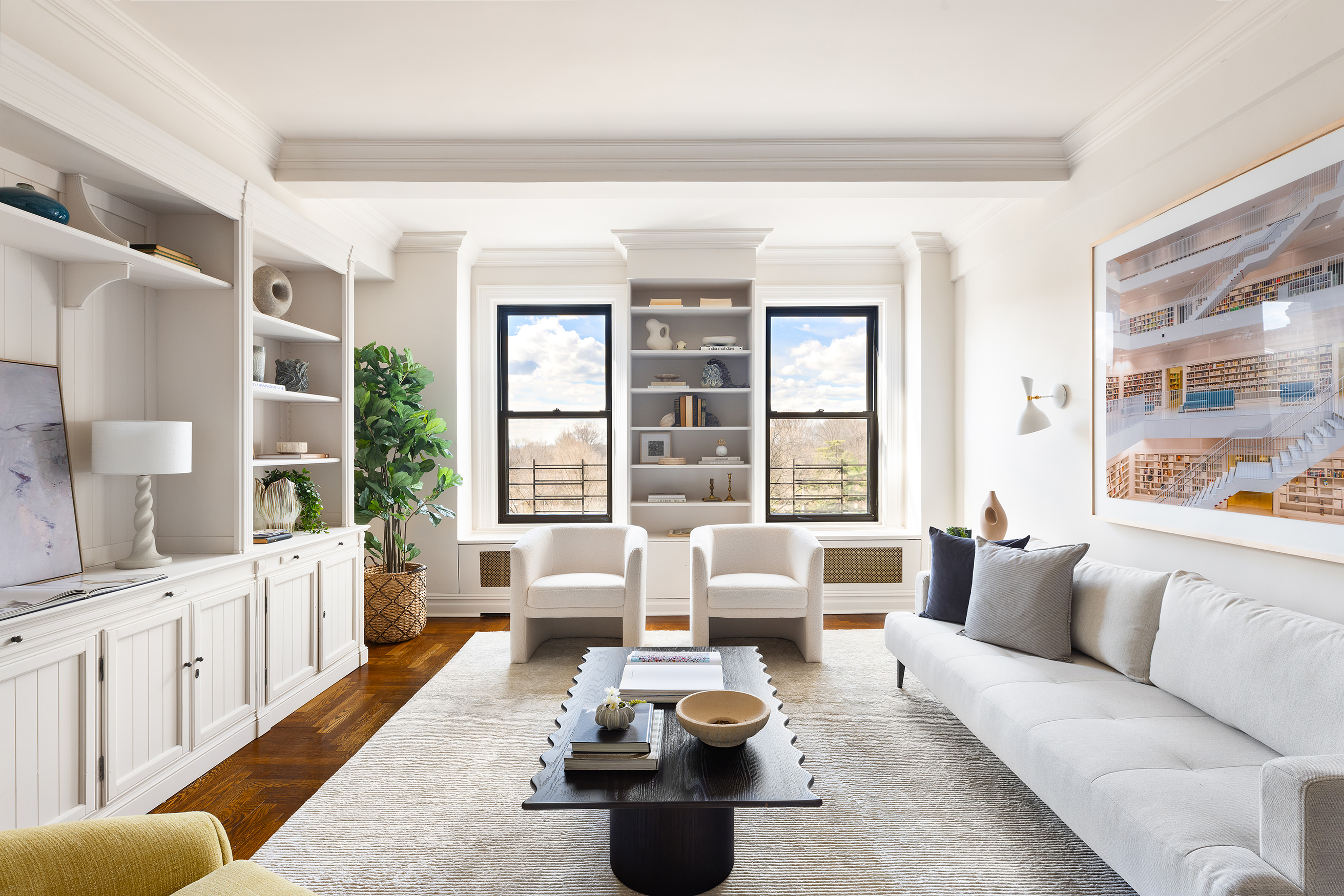 135 Eastern Parkway, Unit 7A Brooklyn, NY 11238 - Photo 2 of 15 a living room with furniture and a large window