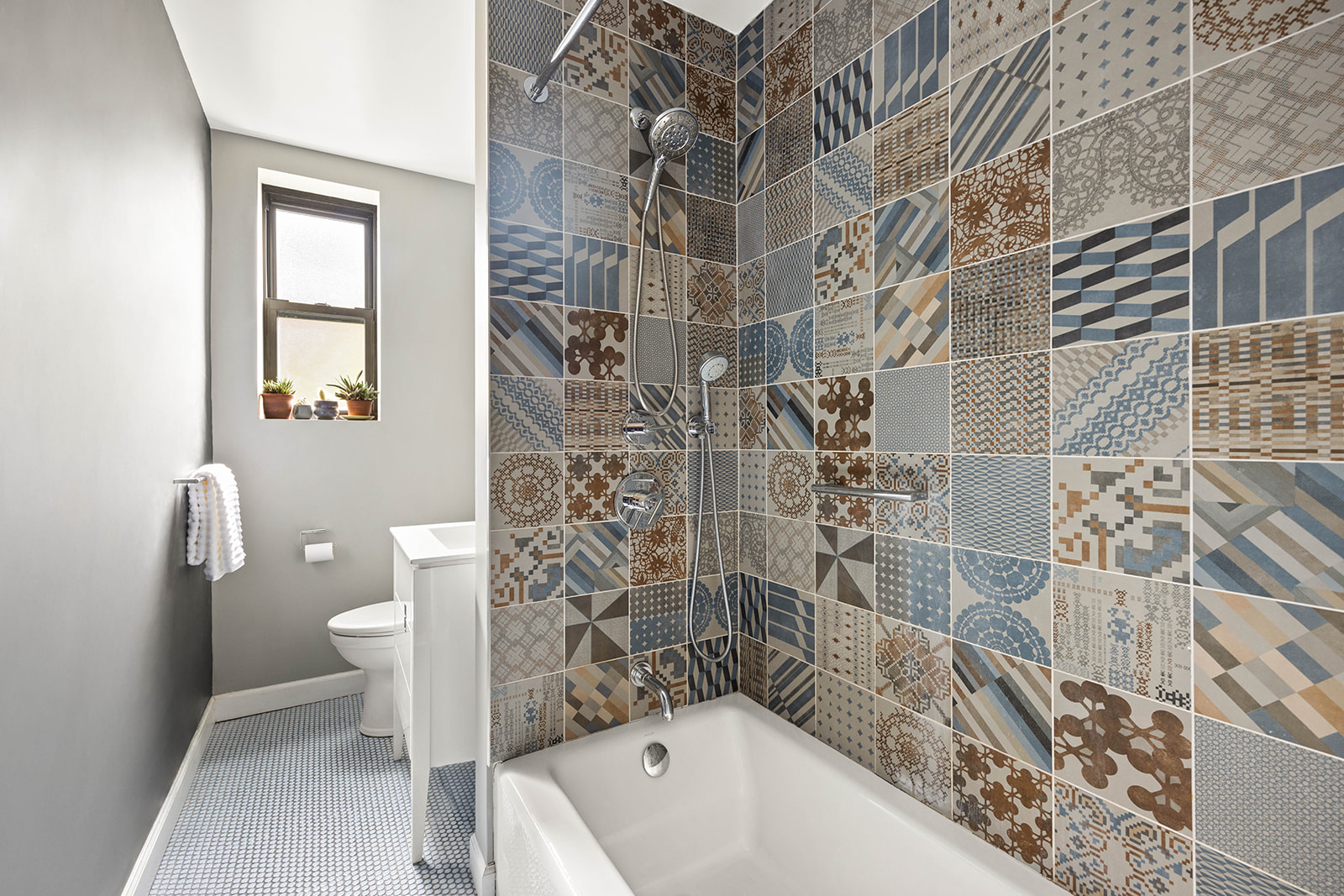 100 Ocean Parkway, Unit 3H Brooklyn, NY 11218 - Photo 8 of 11 a bathroom with a bathtub and toilet