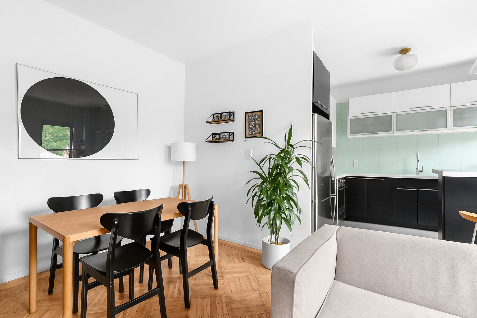 394 Lincoln Place, Unit C2 Brooklyn, NY 11238 - Photo 5 of 13 a dining room with furniture and a mirror