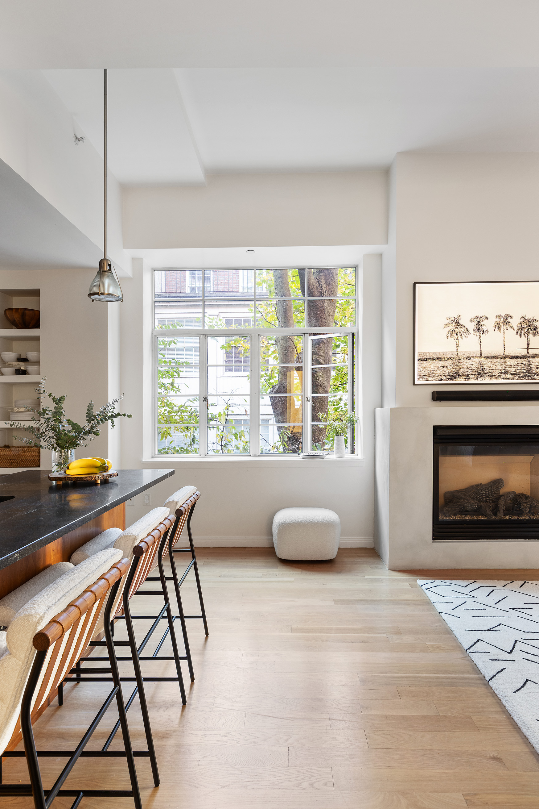 9 College Place, Unit 2K Brooklyn, NY 11201 - Photo 4 of 17 a dining room with furniture and a fireplace