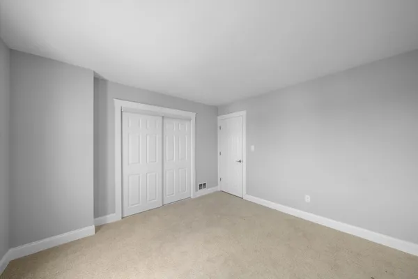 an aerial view of a house with lake view