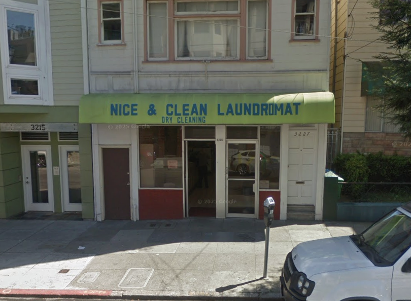 3225 21st Street San Francisco, CA 94110 - Photo 2 of 14 a front view of a building with garden