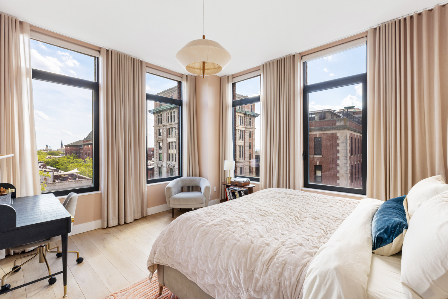 347 Henry Street, Unit 5B Brooklyn, NY 11201 - Photo 8 of 25 a spacious bedroom with a large bed and a large window
