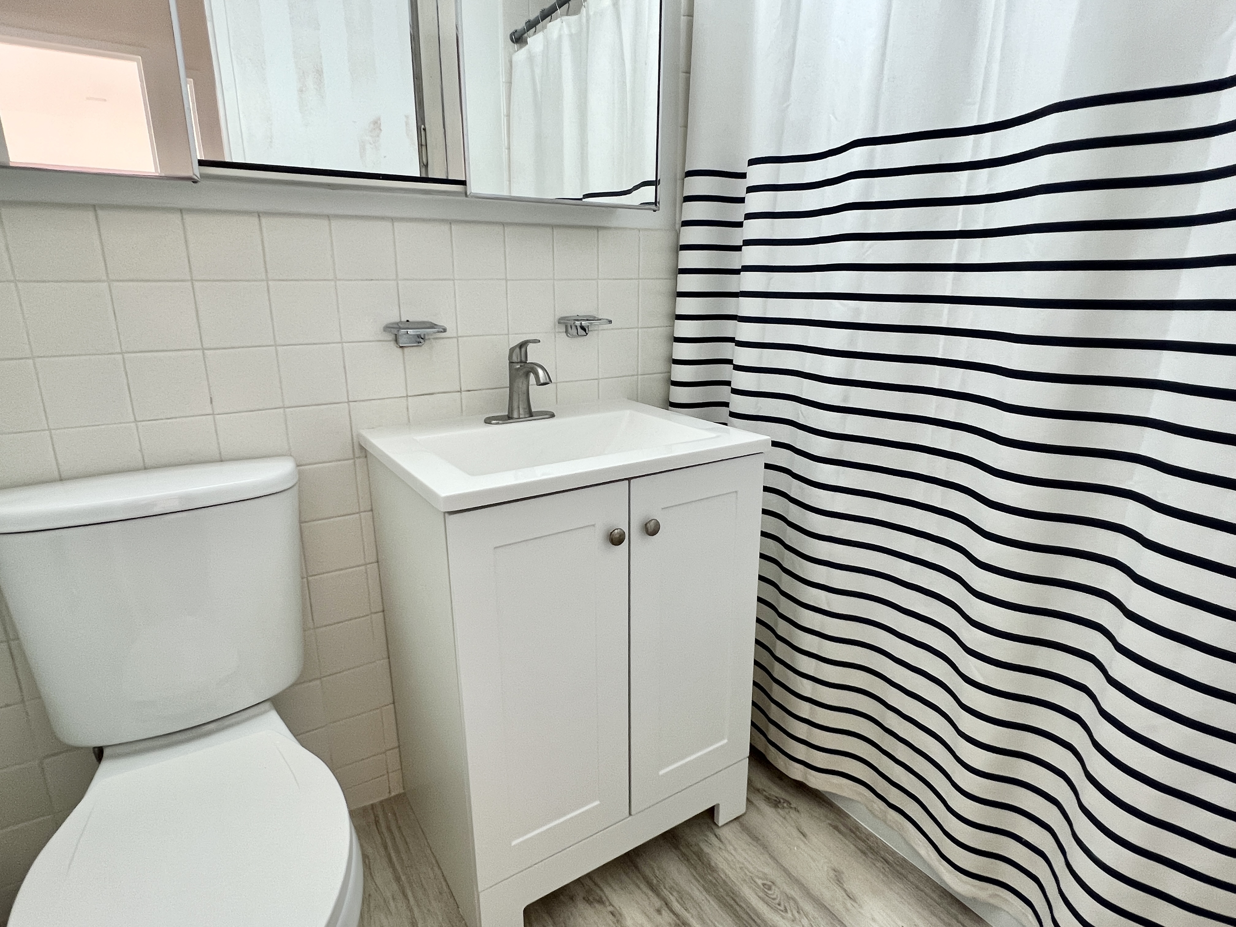 520 N Street Southwest, Unit S622 Washington, DC 20024 - Photo 6 of 25 a bathroom with a toilet and a sink