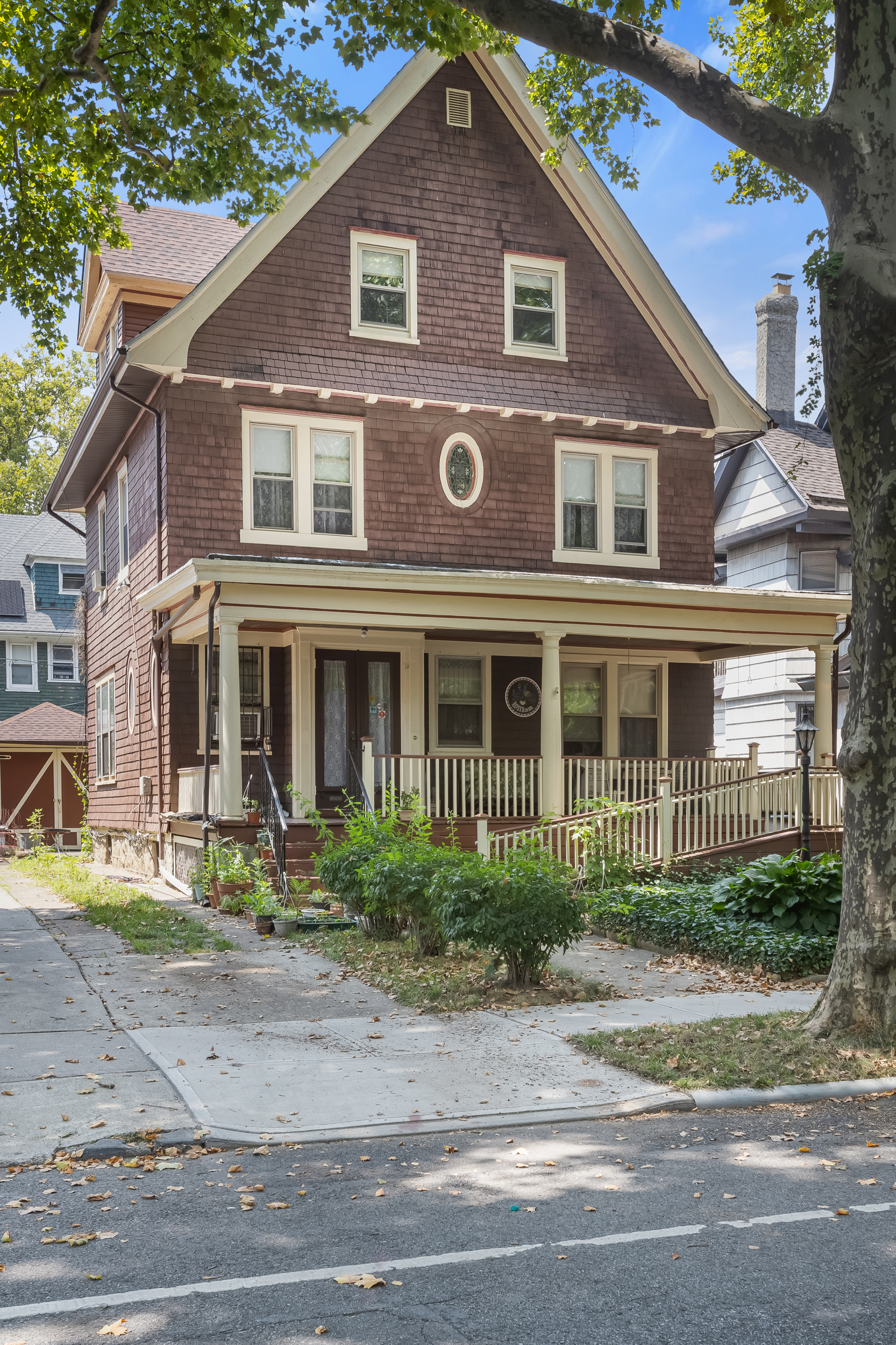686 Rugby Road Brooklyn, NY 11230 - Photo 1 of 18 a front view of a house with a garden