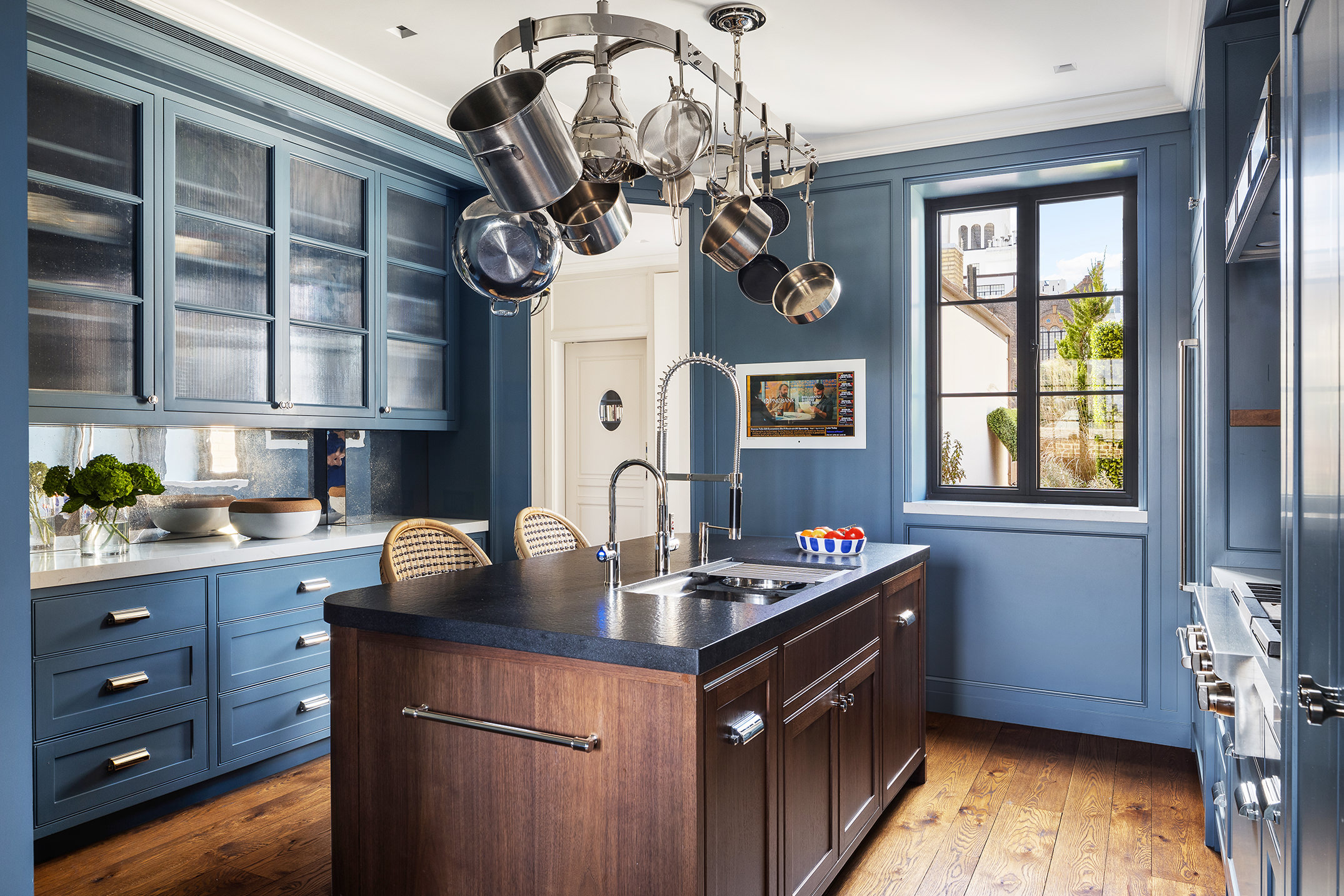 150 East 73rd Street, Unit PH Manhattan, NY 10021 - Photo 9 of 29 a kitchen with a sink cabinets and window