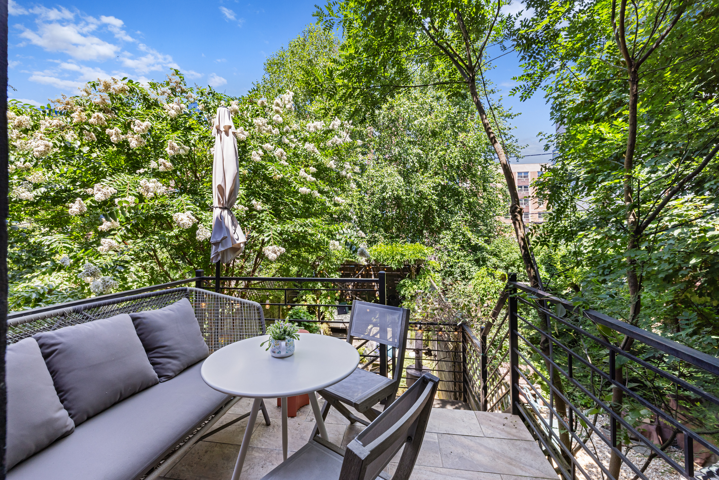 439 A Monroe Street Brooklyn, NY 11221 - Photo 25 of 29 a balcony with furniture and a potted plant