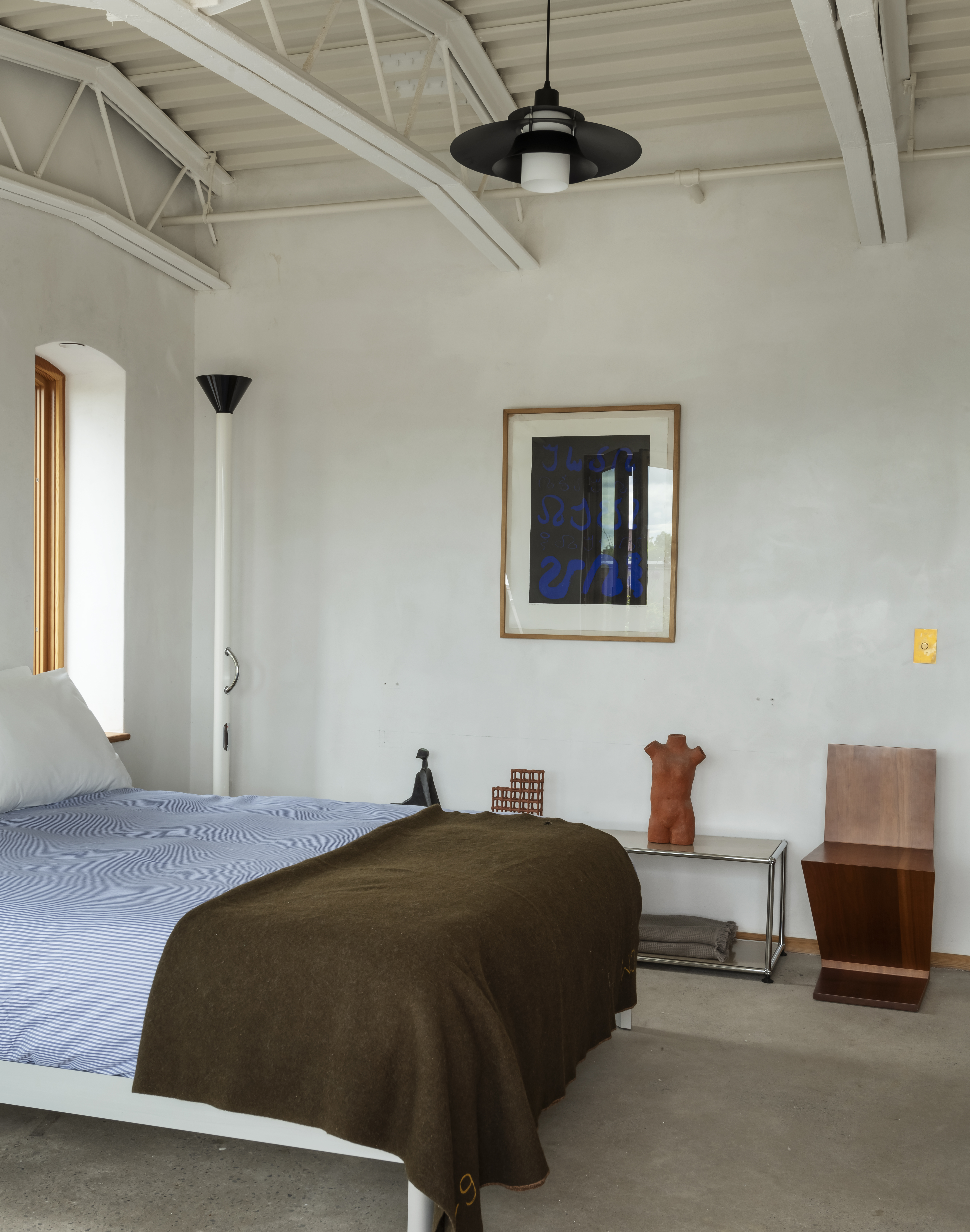 96 King Street, Unit 3 Brooklyn, NY 11231 - Photo 16 of 24 a bedroom with a bed and a chandelier