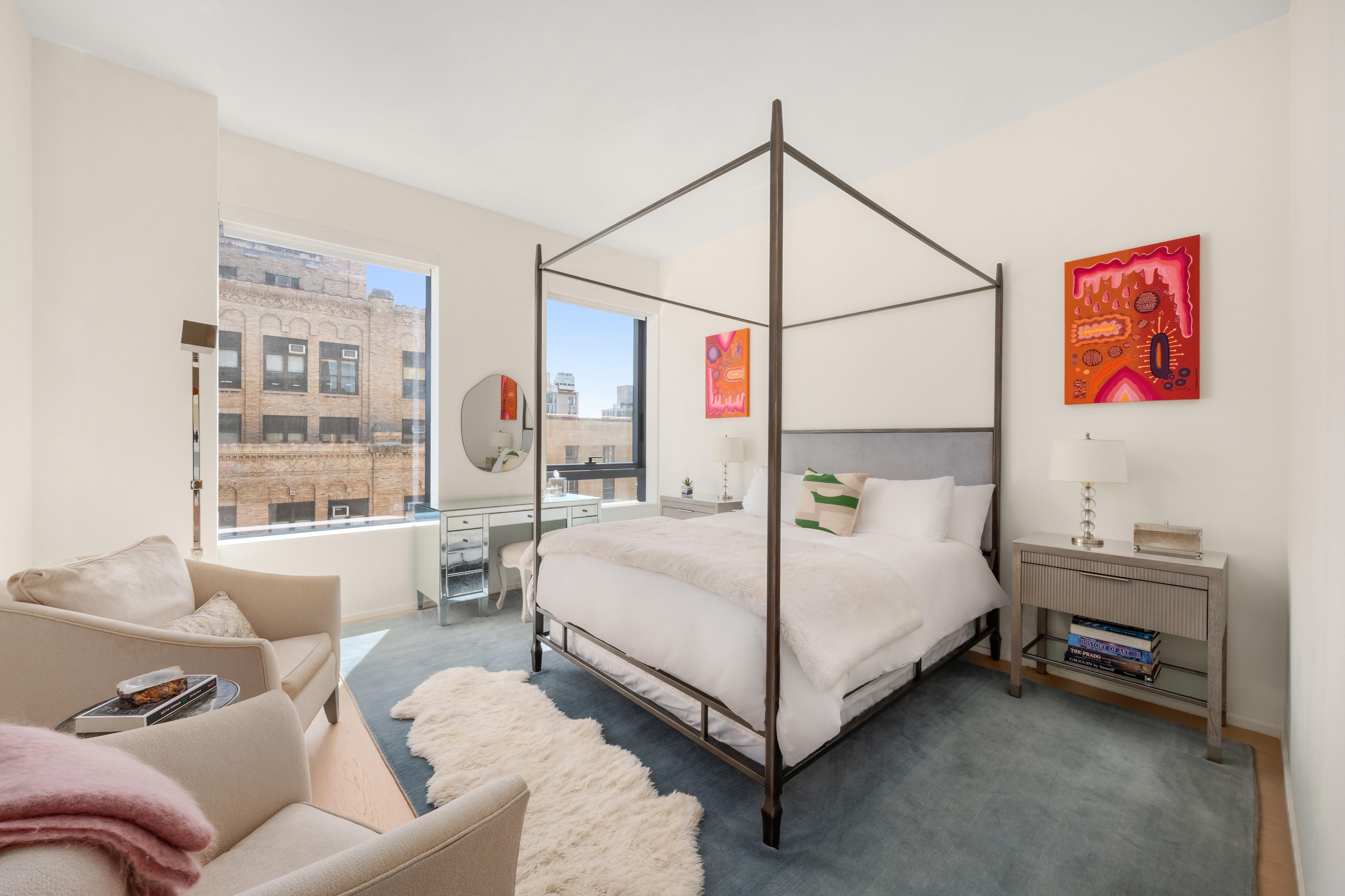 121 East 22nd Street, Unit N1405 Manhattan, NY 10010 - Photo 6 of 19 a bedroom with a bed couch and a window