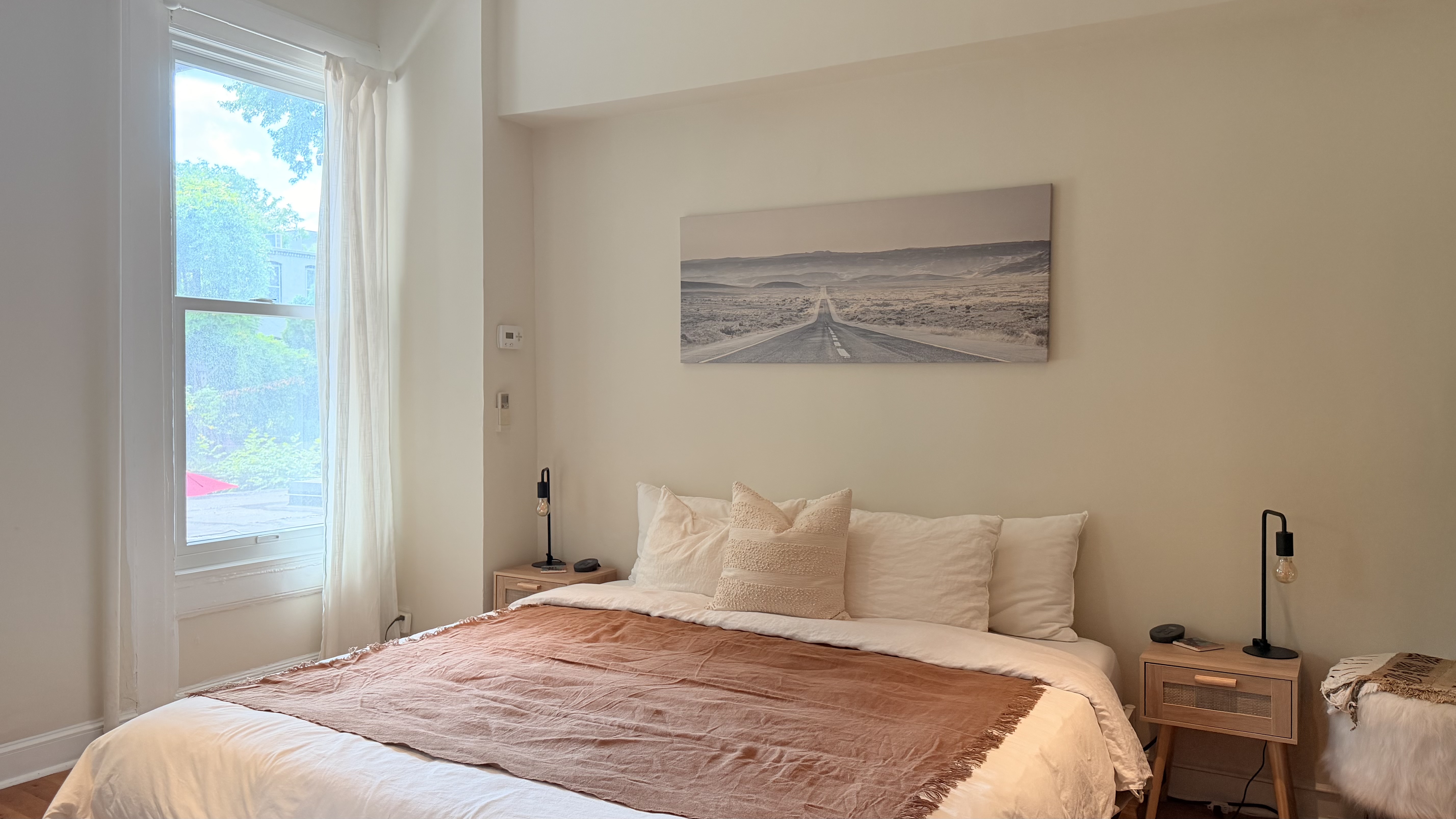 226 11th Street, Unit 2 Brooklyn, NY 11215 - Photo 10 of 19 a bedroom with a bed and a window
