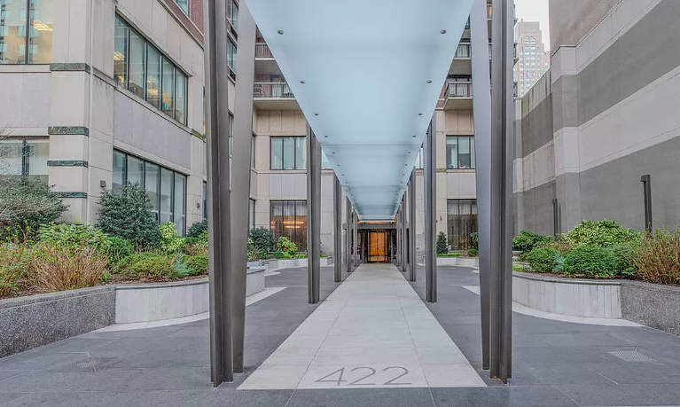 422 East 72nd Street, Unit 37AD Manhattan, NY 10021 - Photo 33 of 38 a view of a brick building with many windows