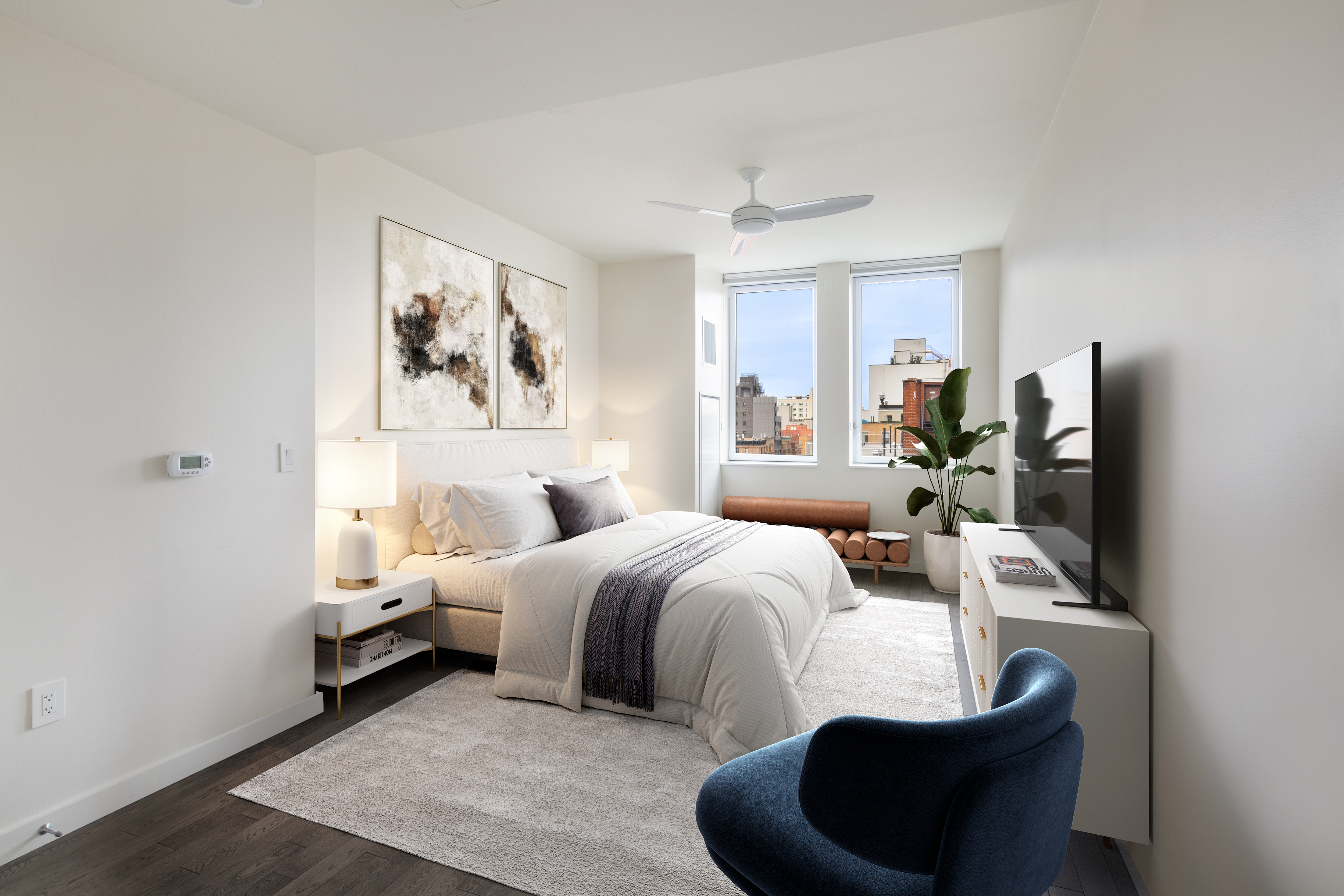 285 West 110th Street, Unit 7B Manhattan, NY 10026 - Photo 2 of 10 a bedroom with bed and a flat screen tv