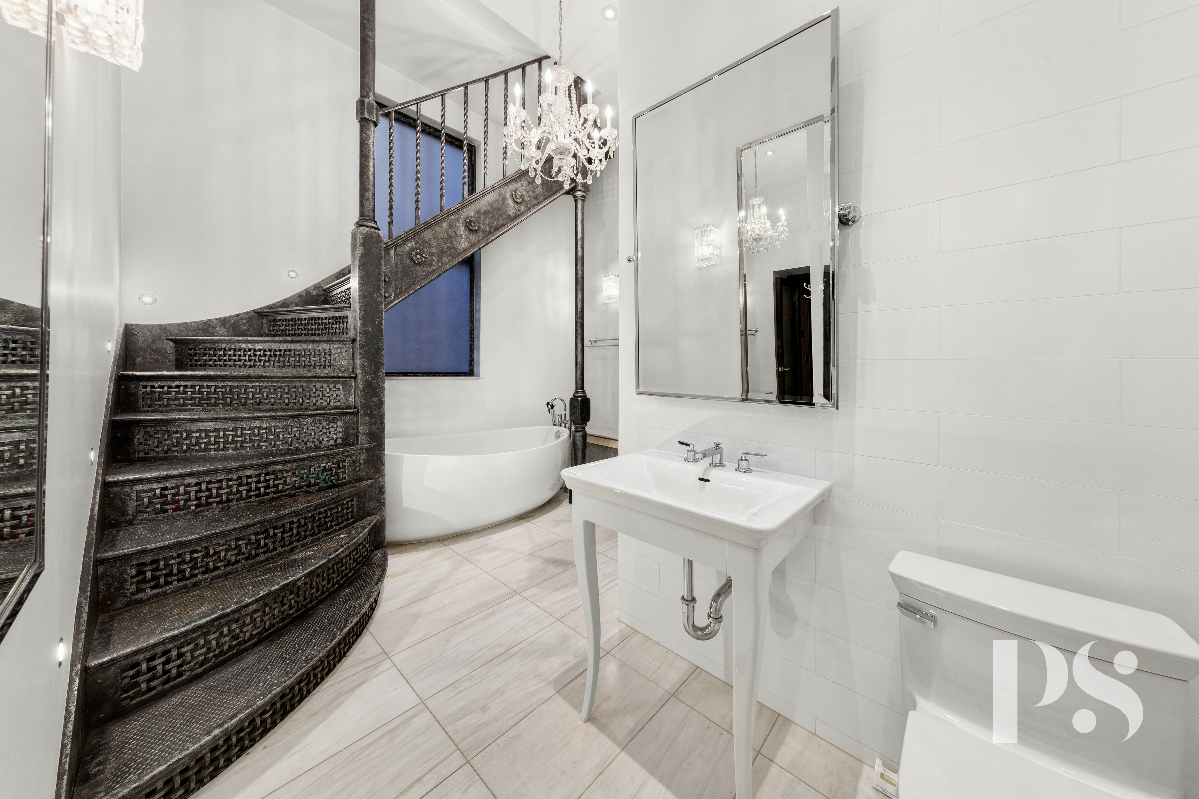 71-73 Bleecker Street, Unit 2E Manhattan, NY 10012 - Photo 11 of 18 a bathroom with a sink a vanity and a mirror