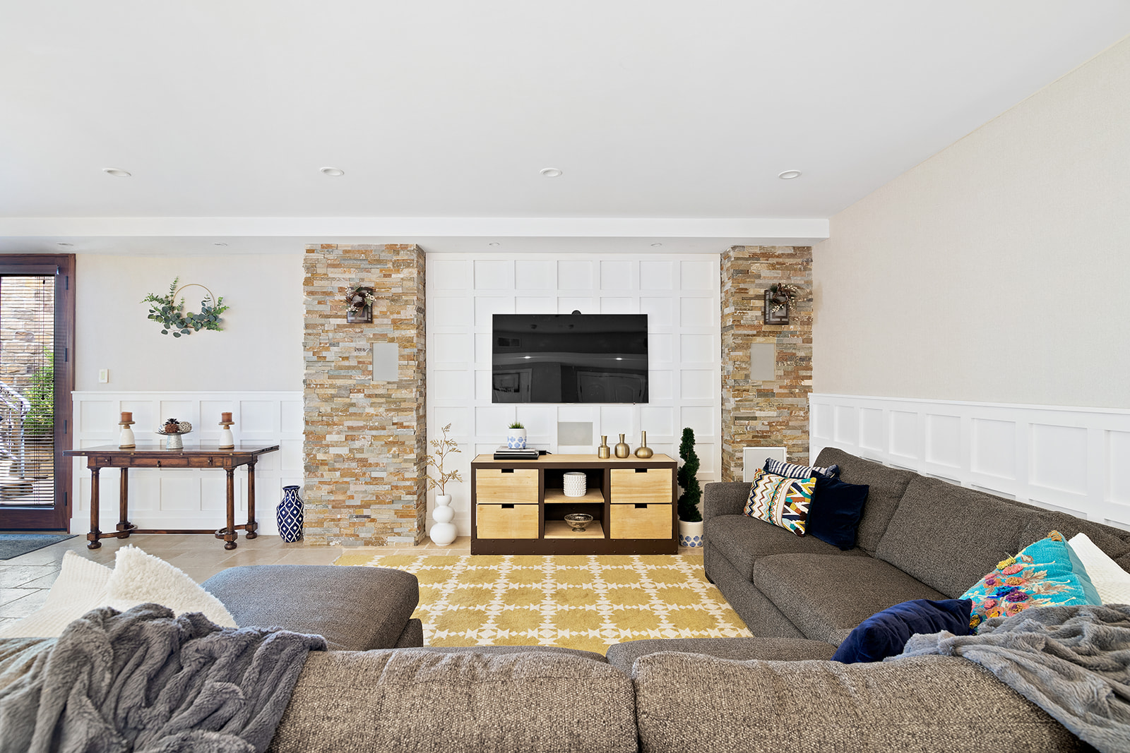 7921 Narrows Avenue Brooklyn, NY 11209 - Photo 34 of 42 a living room with furniture and a flat screen tv