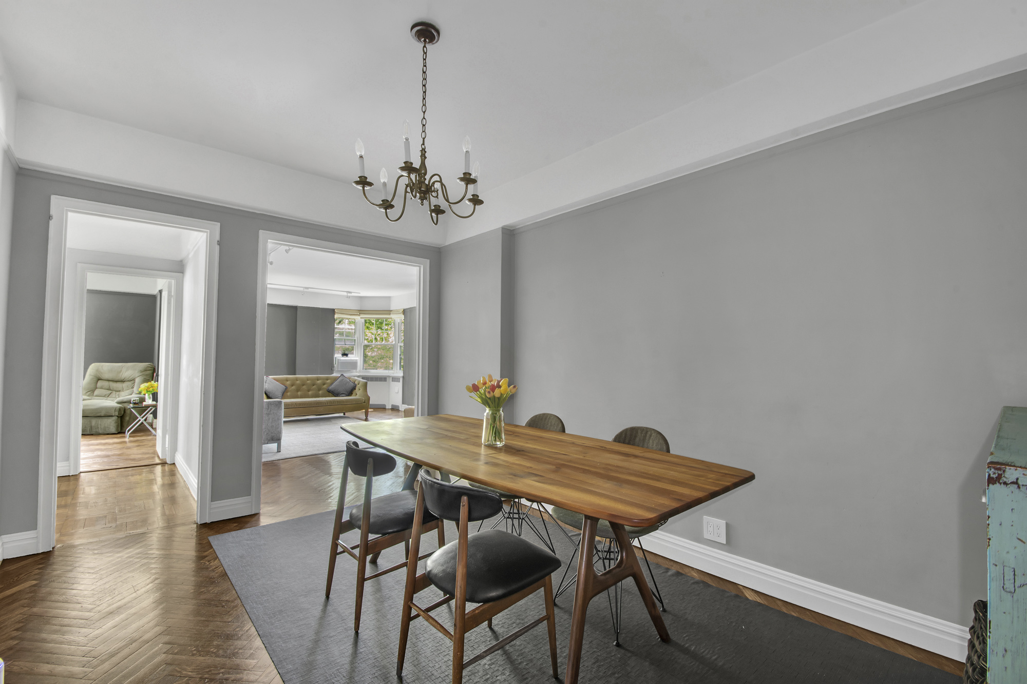 140 Cabrini Boulevard, Unit 14 Manhattan, NY 10033 - Photo 4 of 30 a view of a dining room with furniture window and wooden floor