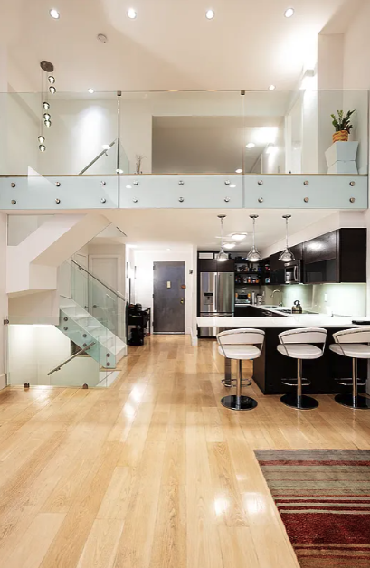 125 East 12th Street, Unit 1E Manhattan, NY 10003 - Photo 4 of 16 a large kitchen with a table and chairs in it