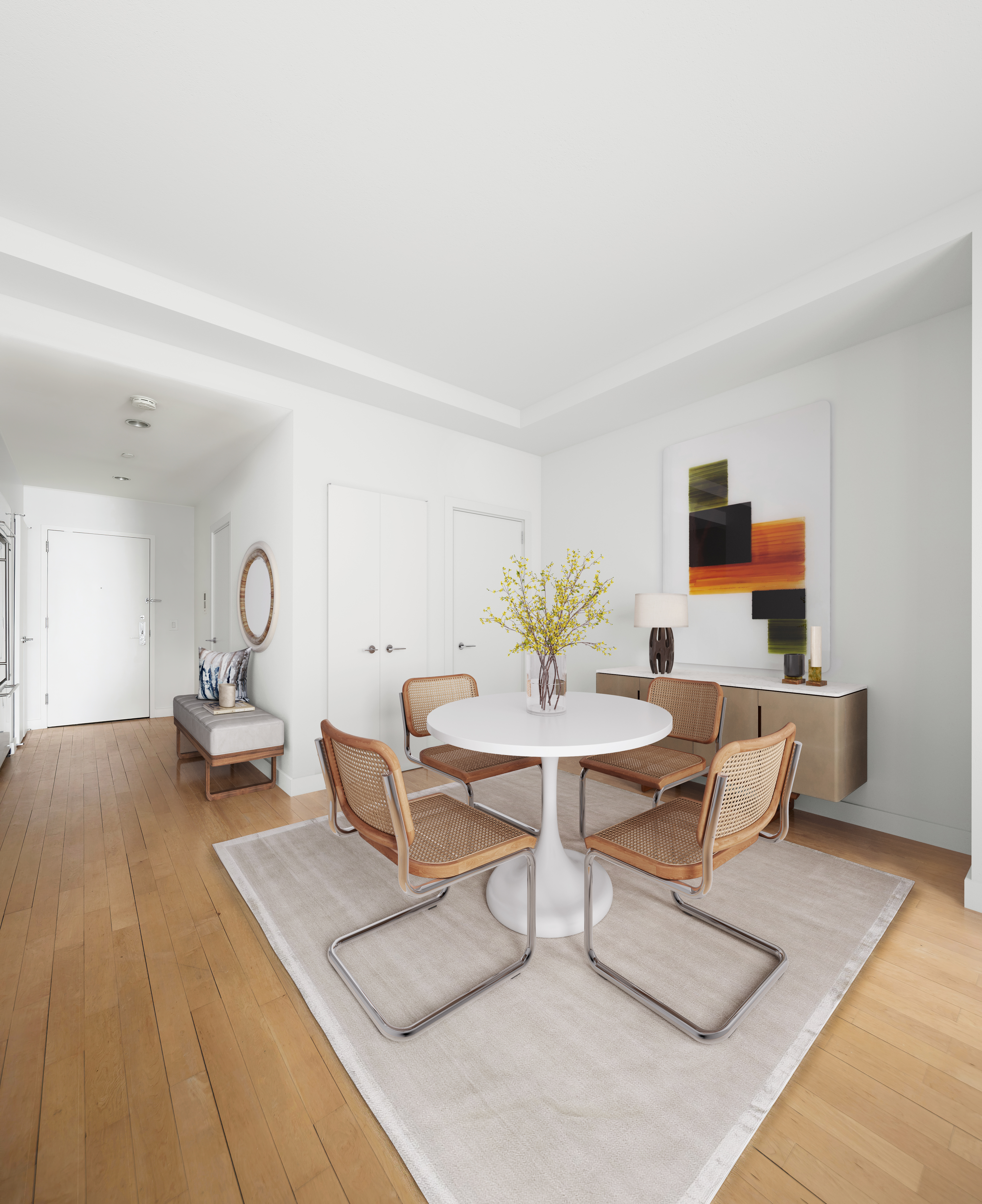 15 Broad Street, Unit 2108 Manhattan, NY 10005 - Photo 4 of 22 a living room with furniture a rug and a table