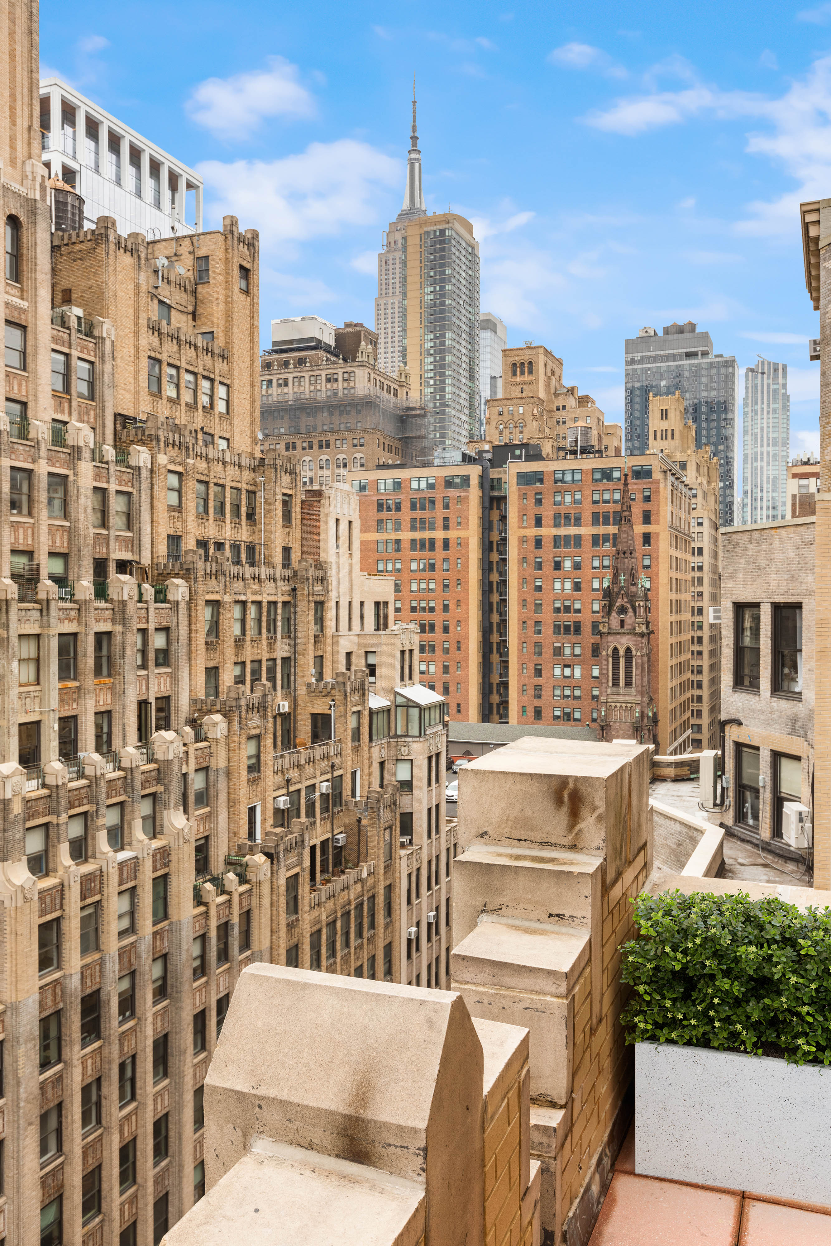 252 West 30th Street, Unit 12 Manhattan, NY 10001 - Photo 14 of 20 a view of a balcony with a floor to ceiling window