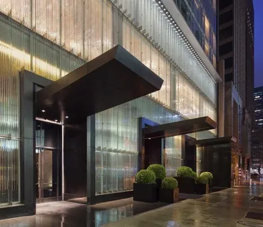 a view of potted plants in front of building