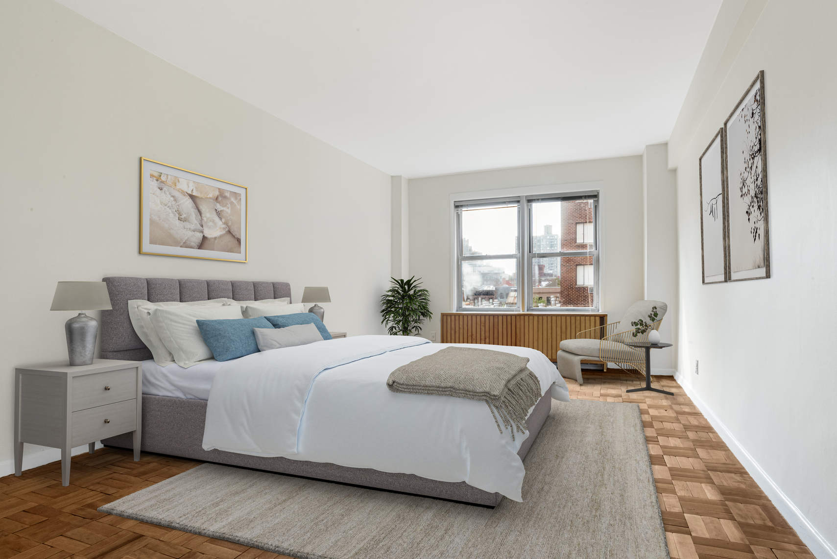 515 East 85th Street, Unit 8C Manhattan, NY 10028 - Photo 3 of 10 a bedroom with a large bed and a window