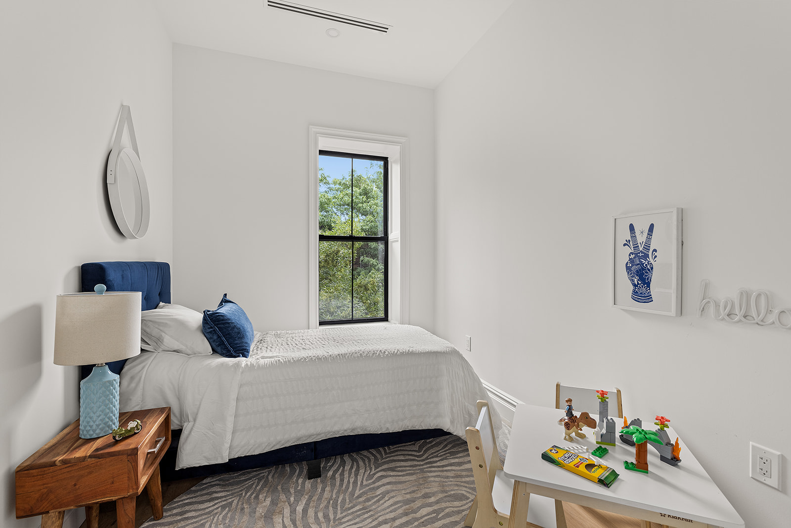 17 Linden Street Brooklyn, NY 11221 - Photo 12 of 19 a bedroom with a bed and a window