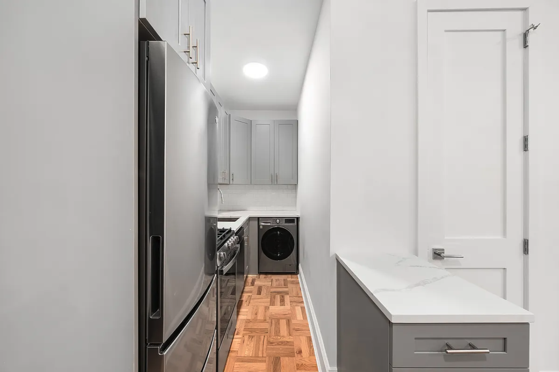 134 West 80th Street, Unit 2R Manhattan, NY 10024 - Photo 4 of 7 a bathroom with a sink and a mirror