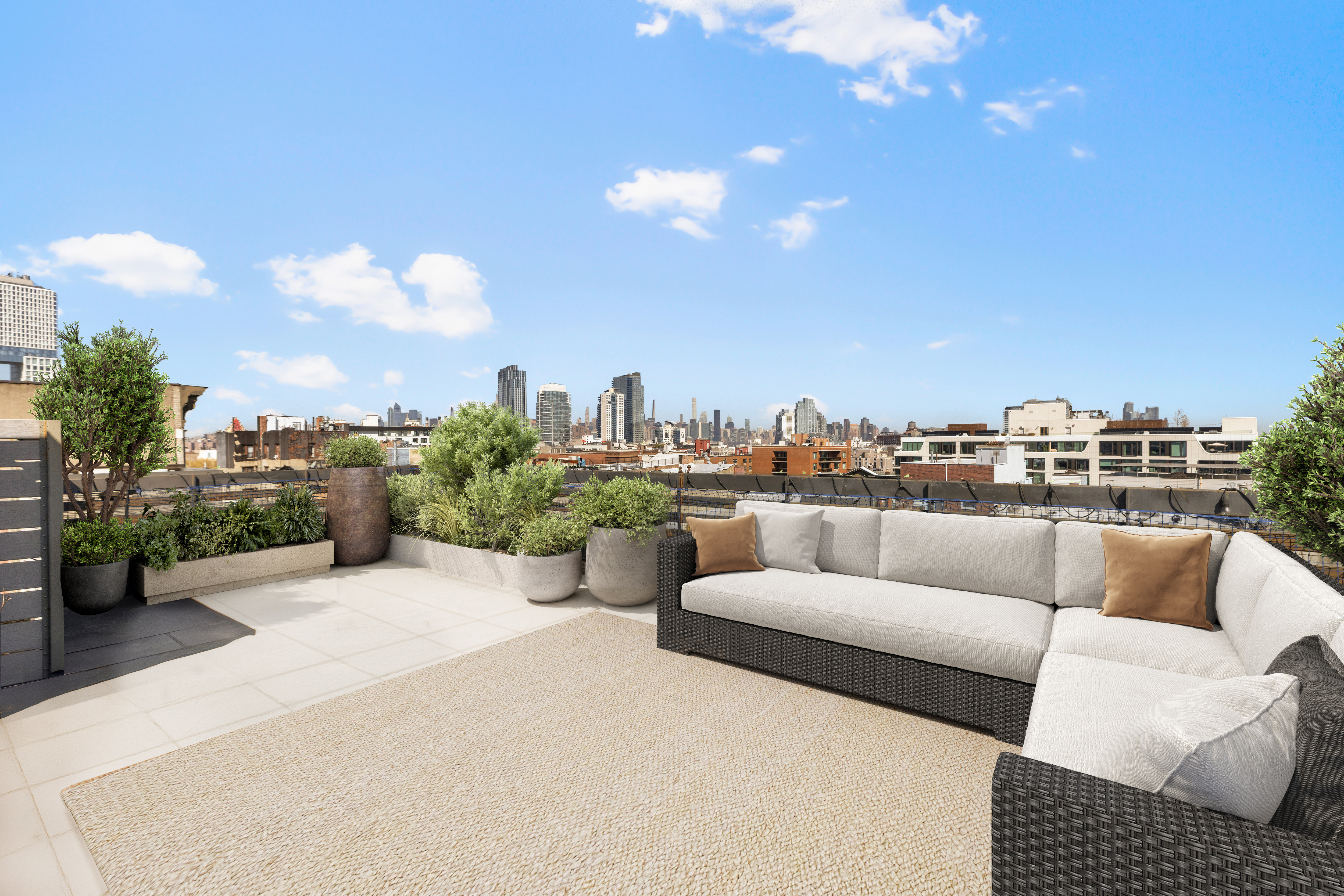 170 South 1st Street, Unit 4B Brooklyn, NY 11211 - Photo 10 of 11 a view of a terrace with couches and sky view