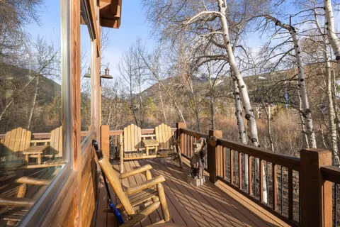 a view of balcony with chairs