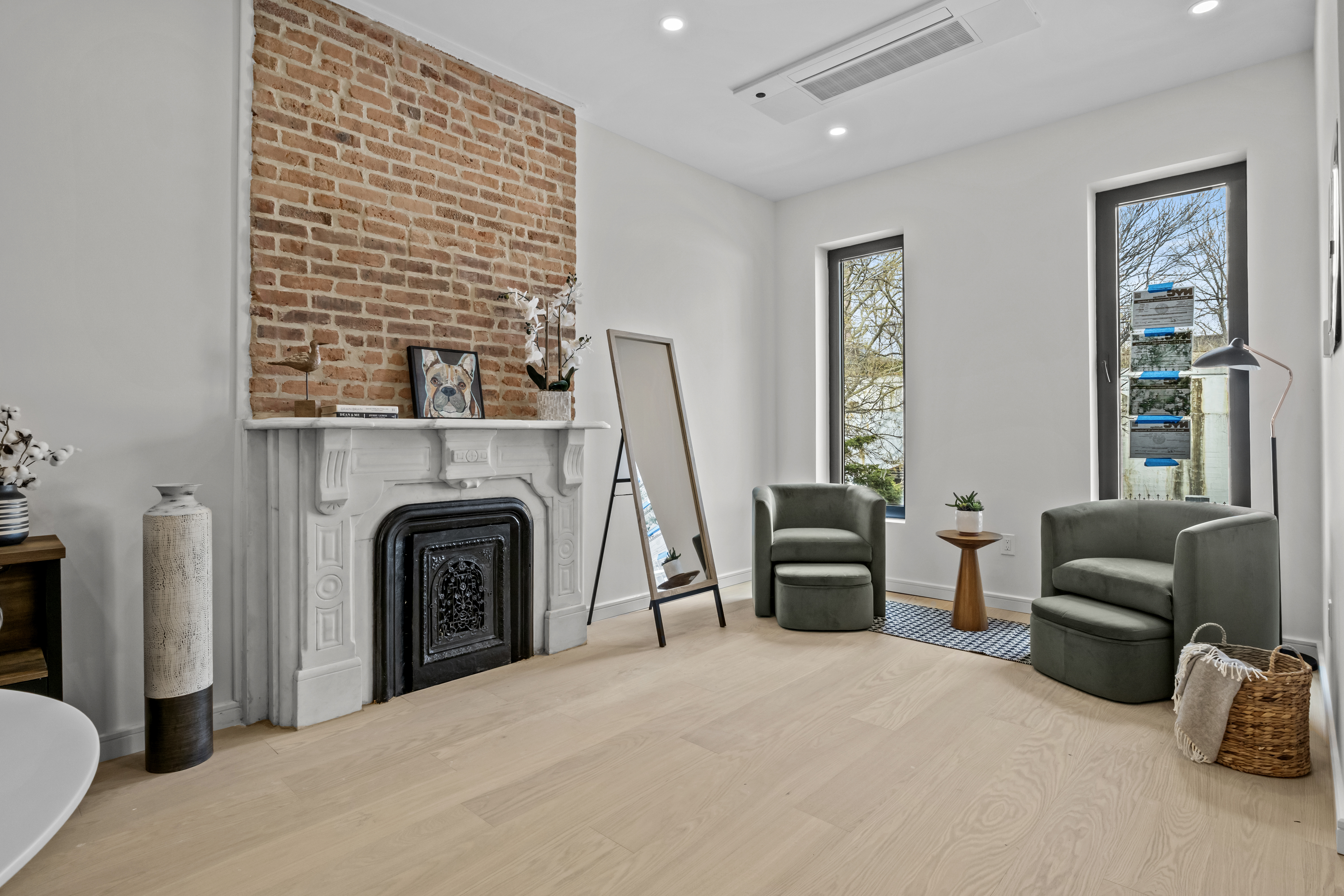 320 10th Street Brooklyn, NY 11215 - Photo 11 of 41 a living room with furniture and a fireplace