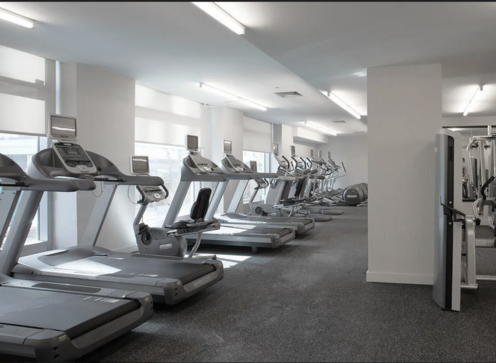 22 North 6th Street, Unit 12J Brooklyn, NY 11249 - Photo 9 of 13 a view of a room with gym equipment