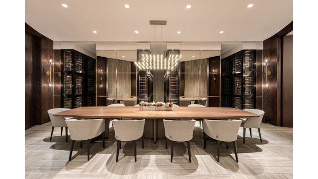 108 Leonard Street, Unit 4A Manhattan, NY 10013 - Photo 15 of 18 a large dining space with furniture a chandelier and wooden floor
