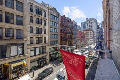 a view of a city with tall buildings