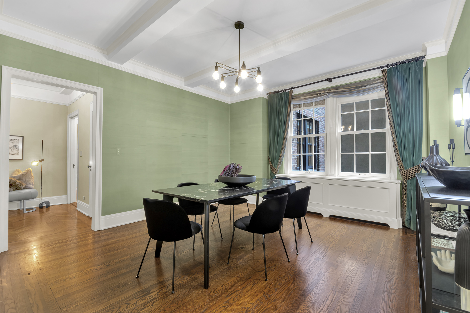 7 Gracie Square, Unit 5A Manhattan, NY 10128 - Photo 14 of 26 a view of a dining room with furniture window and wooden floor