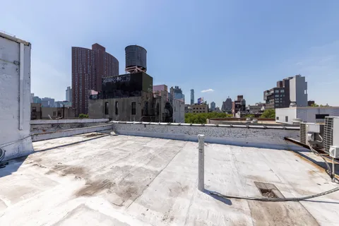 a view of a backyard of a house