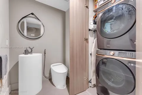a bathroom with a toilet and a sink
