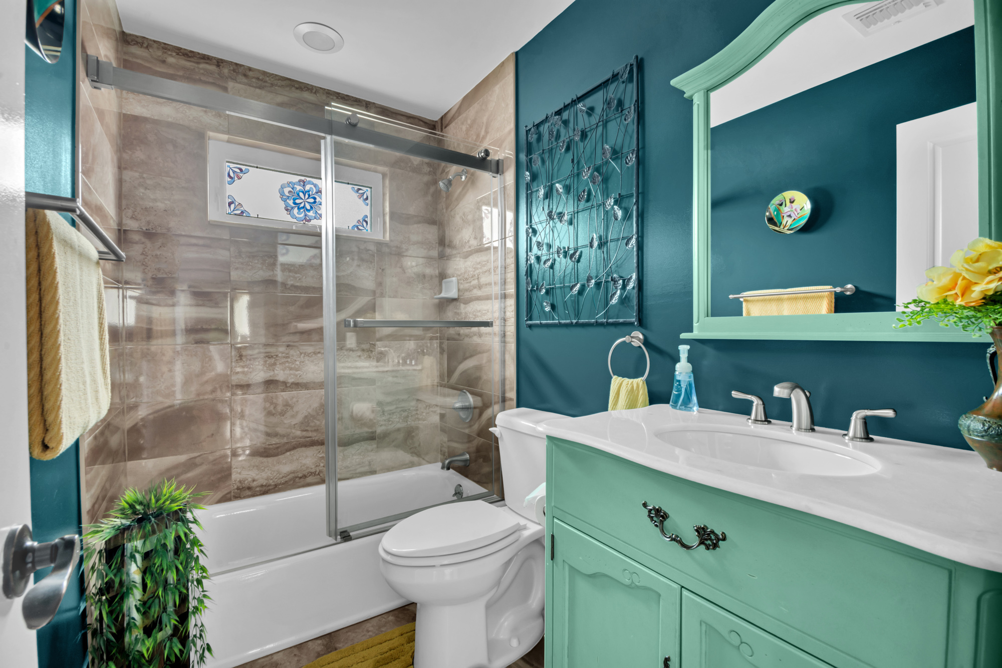 909 Jewett Avenue Staten Island, NY 10314 - Photo 22 of 65 a bathroom with a sink a toilet and shower