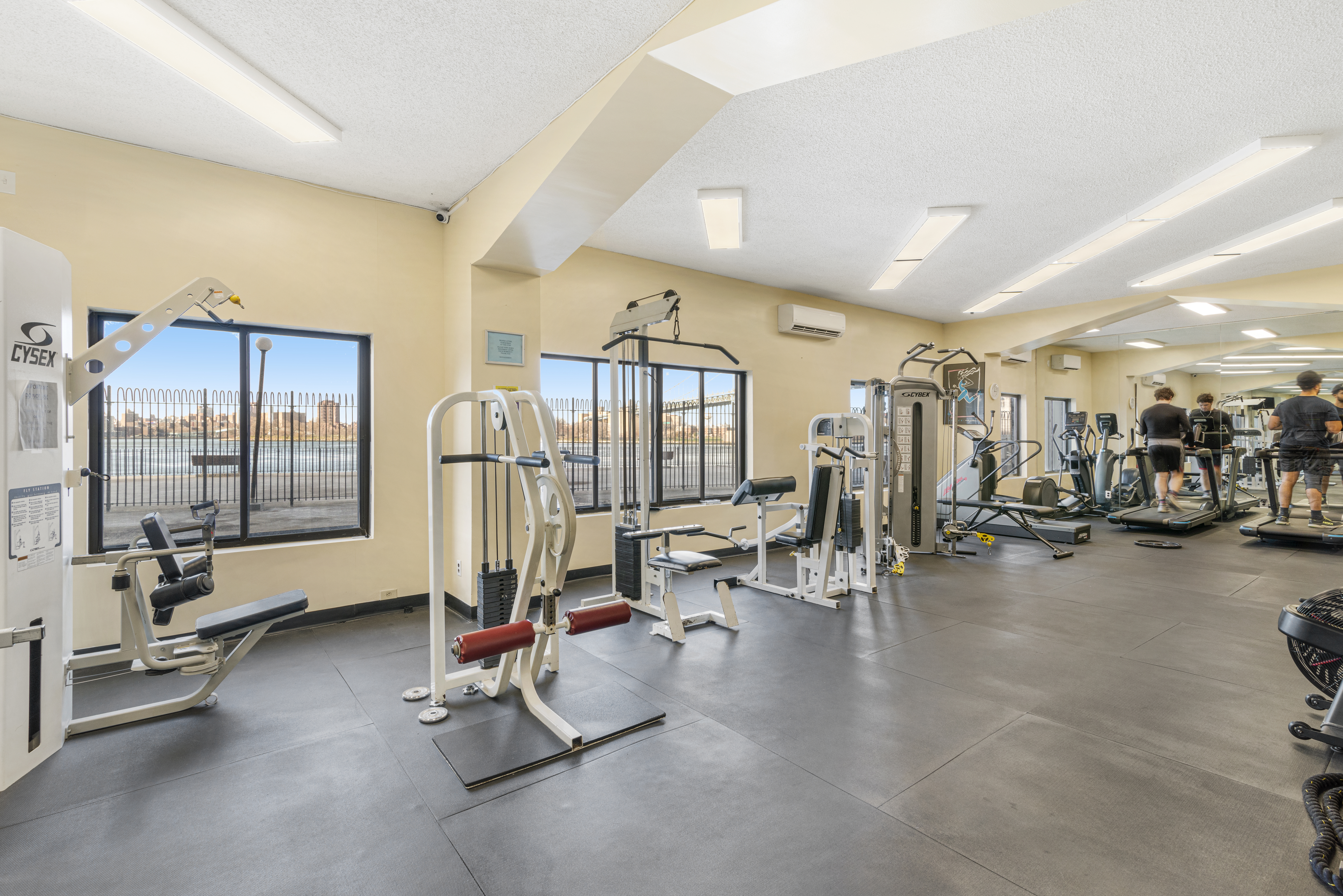 25-40 Shore Boulevard, Unit 15S Queens, NY 11102 - Photo 15 of 21 a view of a room with gym equipment