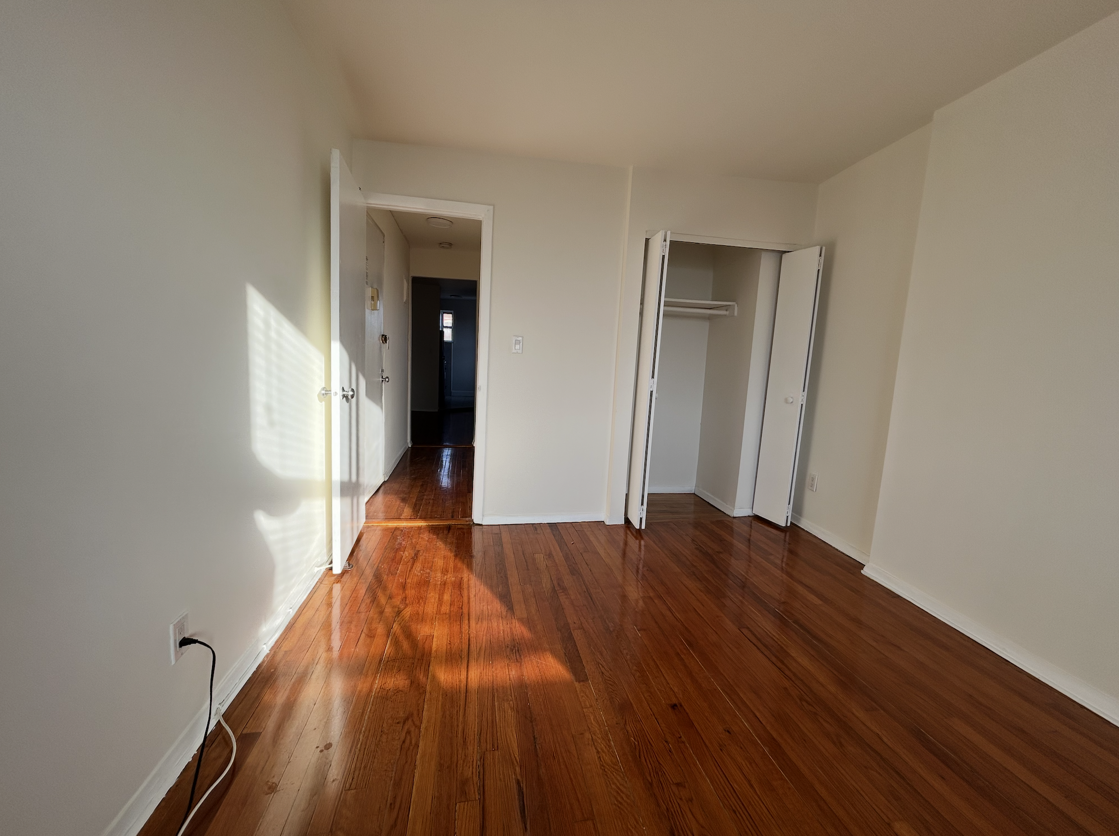 443 Hicks Street, Unit 6H Brooklyn, NY 11201 - Photo 4 of 11 a view of hallway with wooden floor